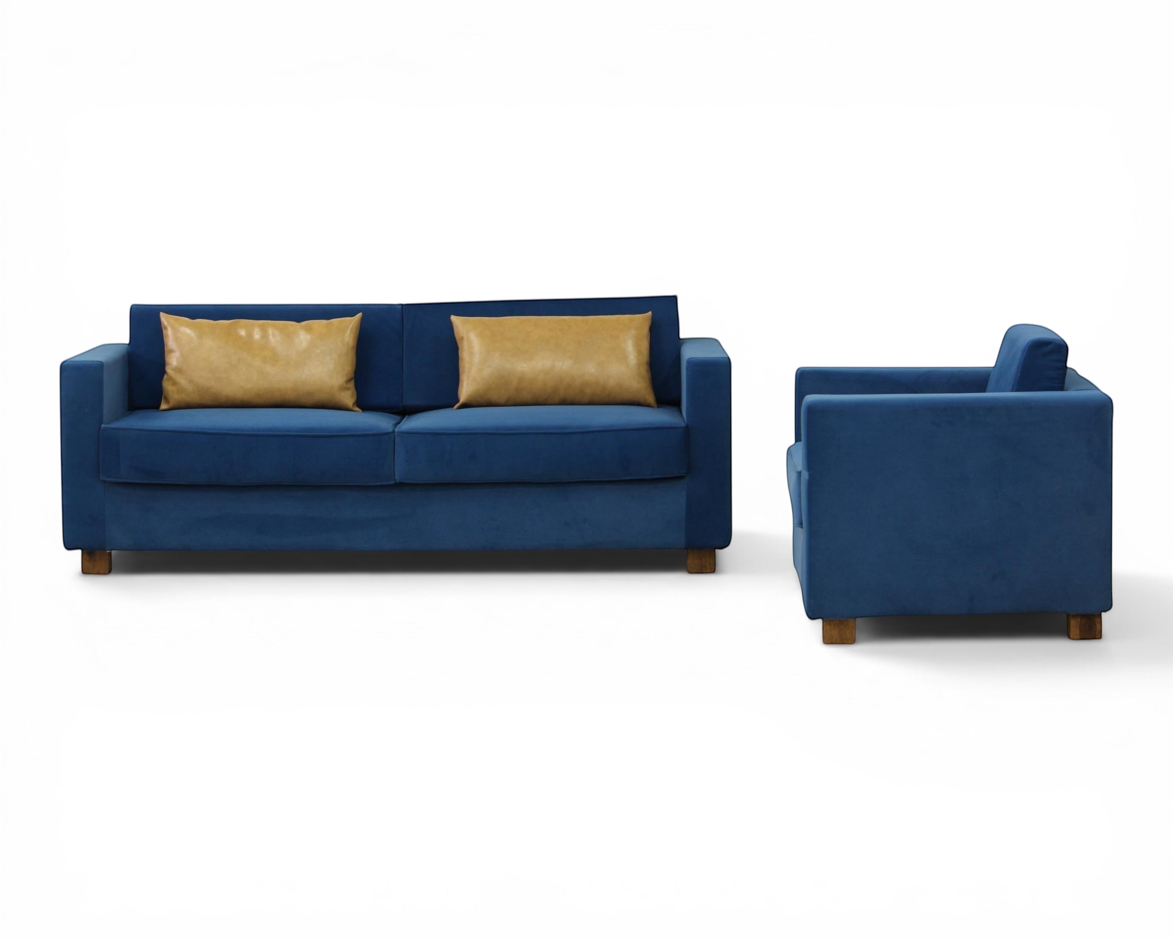 Nakoda Homes blue velvet sofa set with tan accent pillows. Modern, plush upholstery and clean lines.