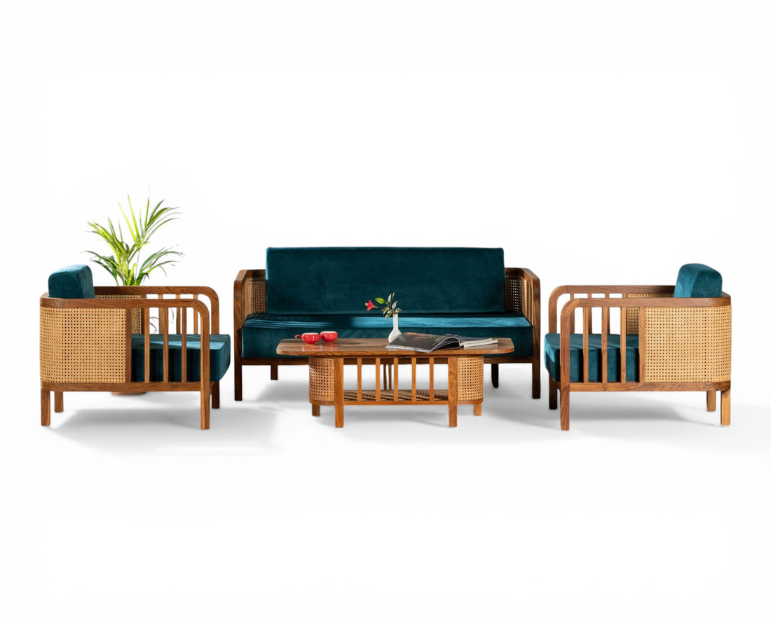 Nakoda Homes 3-seater sofa and armchair set in deep teal velvet with natural wood and cane accents.