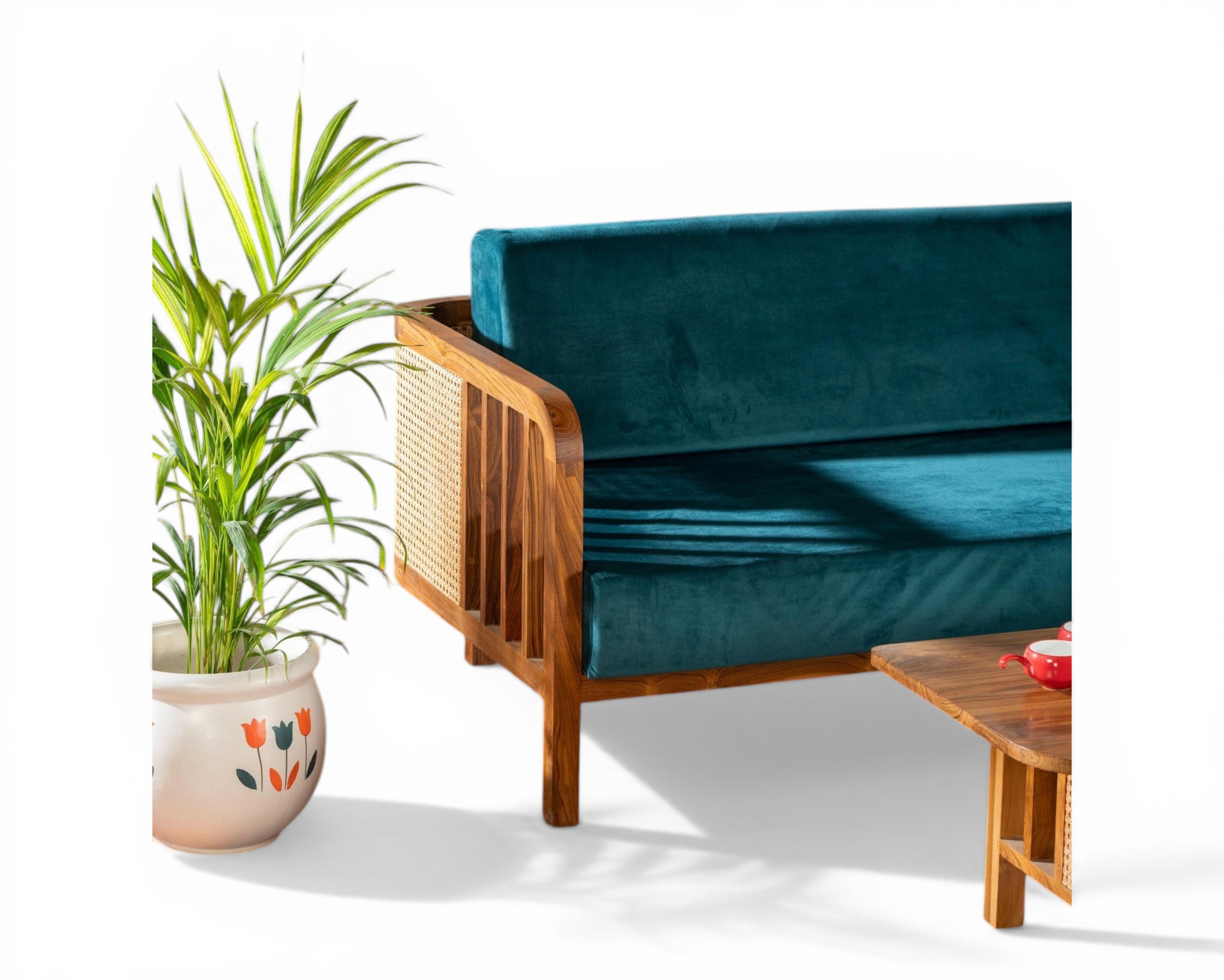 Nakoda Homes 3-seater sofa and armchair set with cane detailing and deep teal velvet upholstery.