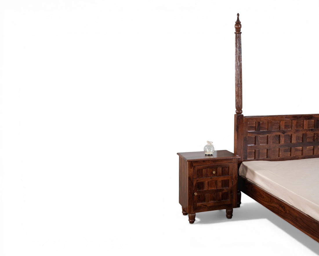 Nakoda Homes solid wood four-poster bed frame with geometric carved headboard and turned legs.