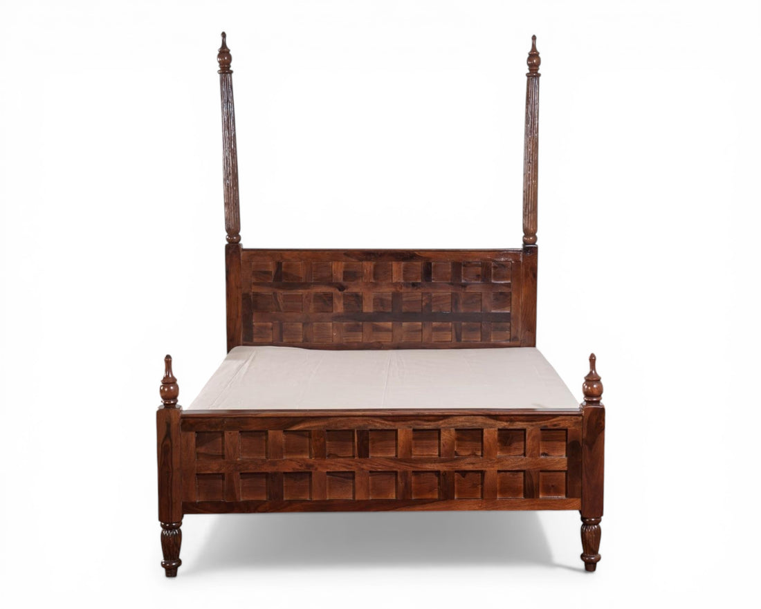 Nakoda Homes solid wood four-poster bed frame with geometric carved headboard and turned legs.