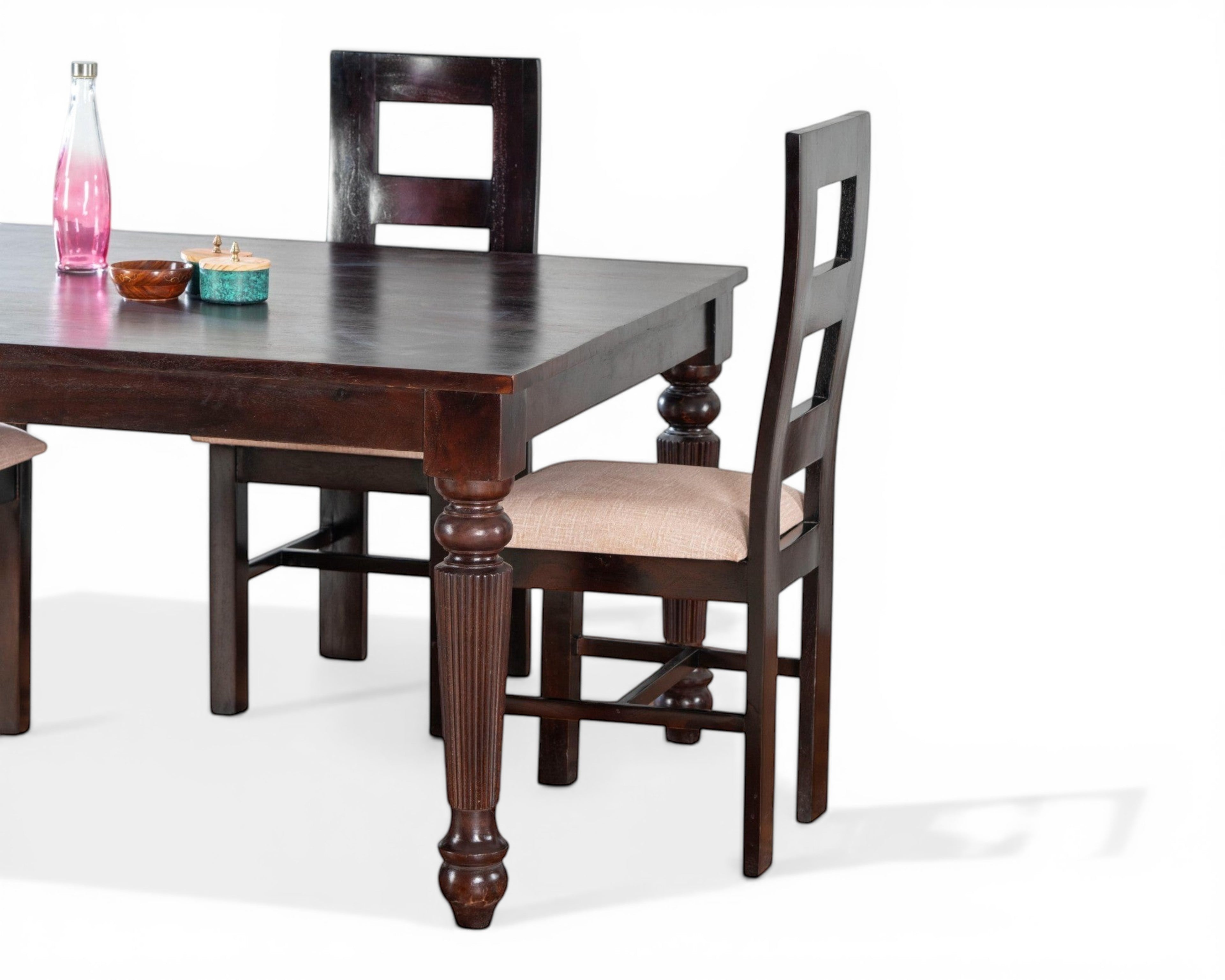 Nakoda Homes dark wood dining set with turned legs and upholstered chairs. Classic design for dining room.