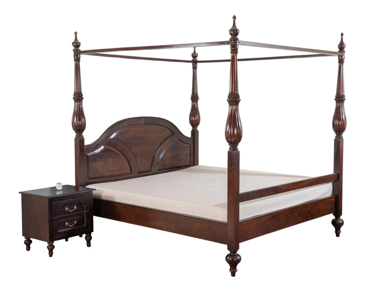 Nakoda Homes dark wood four poster bed frame with arched headboard and turned posts. Canopy design.