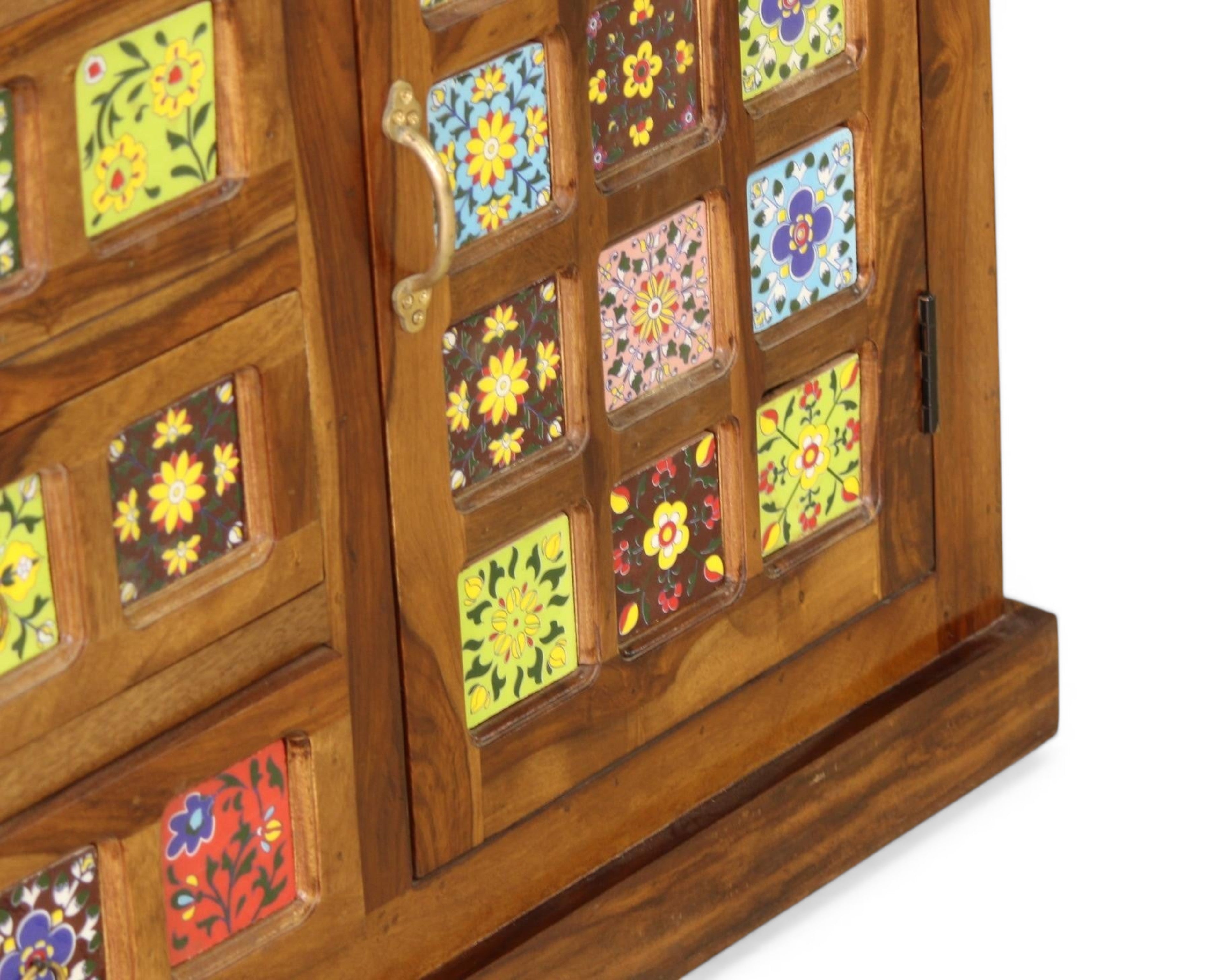 Nakoda Homes wooden cabinet with colorful hand-painted floral tiles and brass handle. Bohemian accent storage.