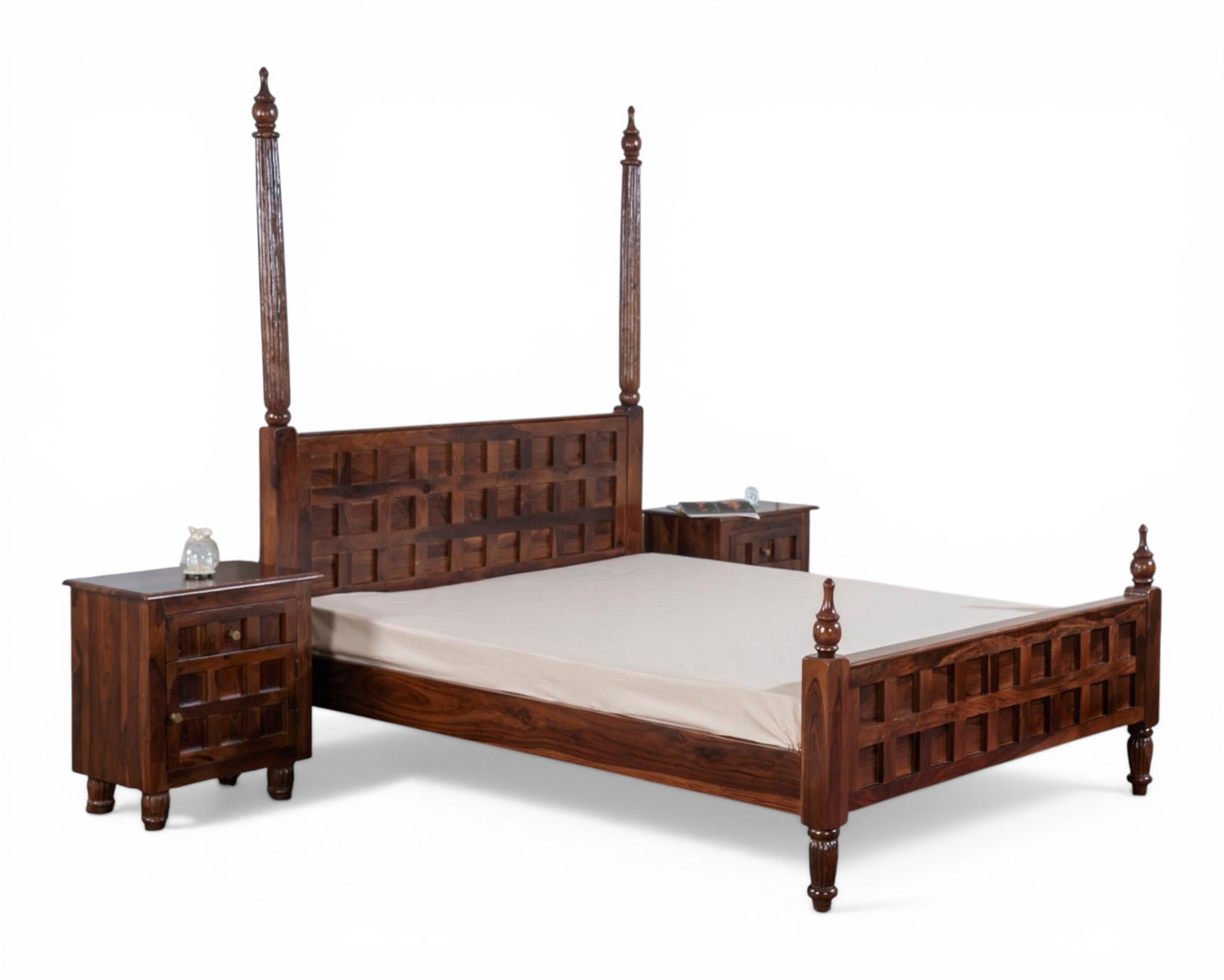 Nakoda Homes solid wood four-poster bed frame with geometric carved headboard and footboard, turned legs, and finials.