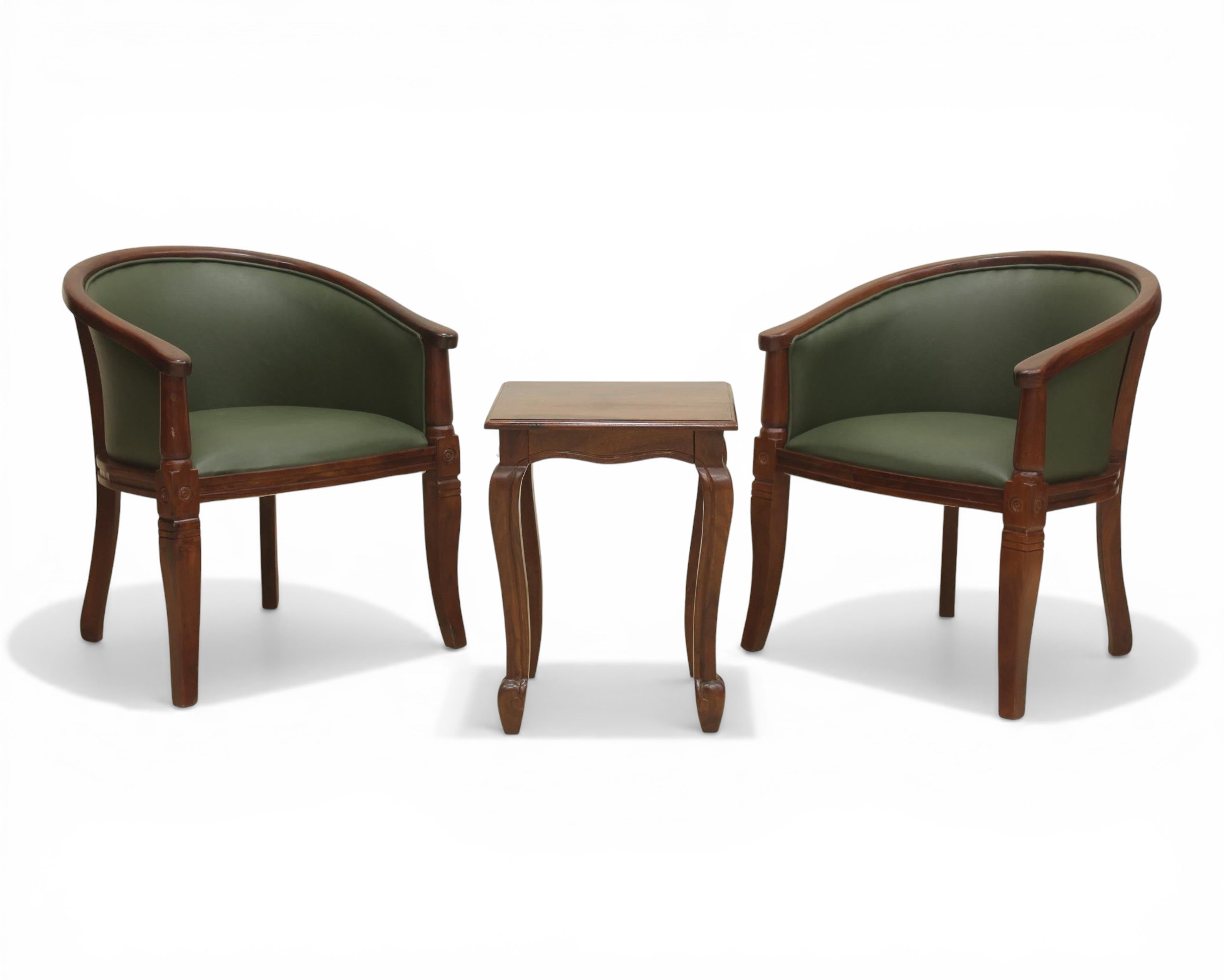 Nakoda Homes forest green faux leather barrel-back accent chair with dark wood frame and turned legs.