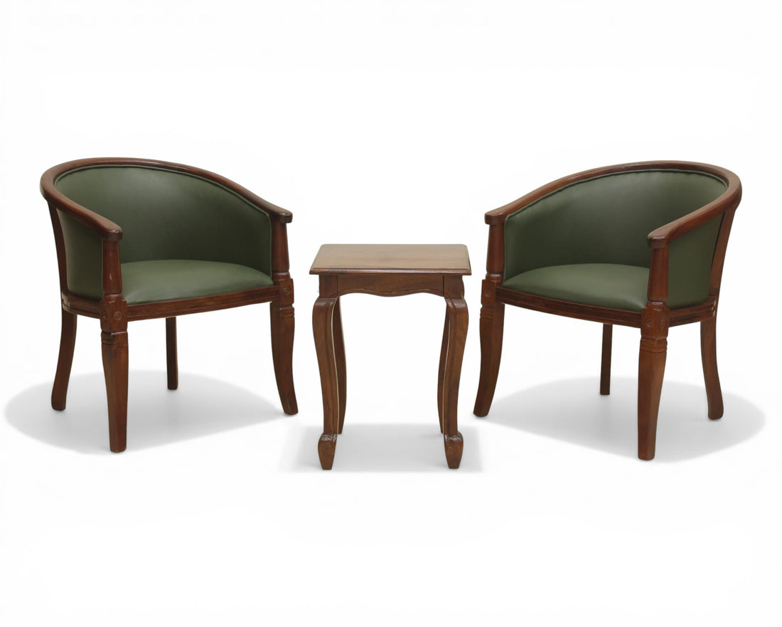 Nakoda Homes forest green faux leather barrel-back accent chair with dark wood frame and turned legs.