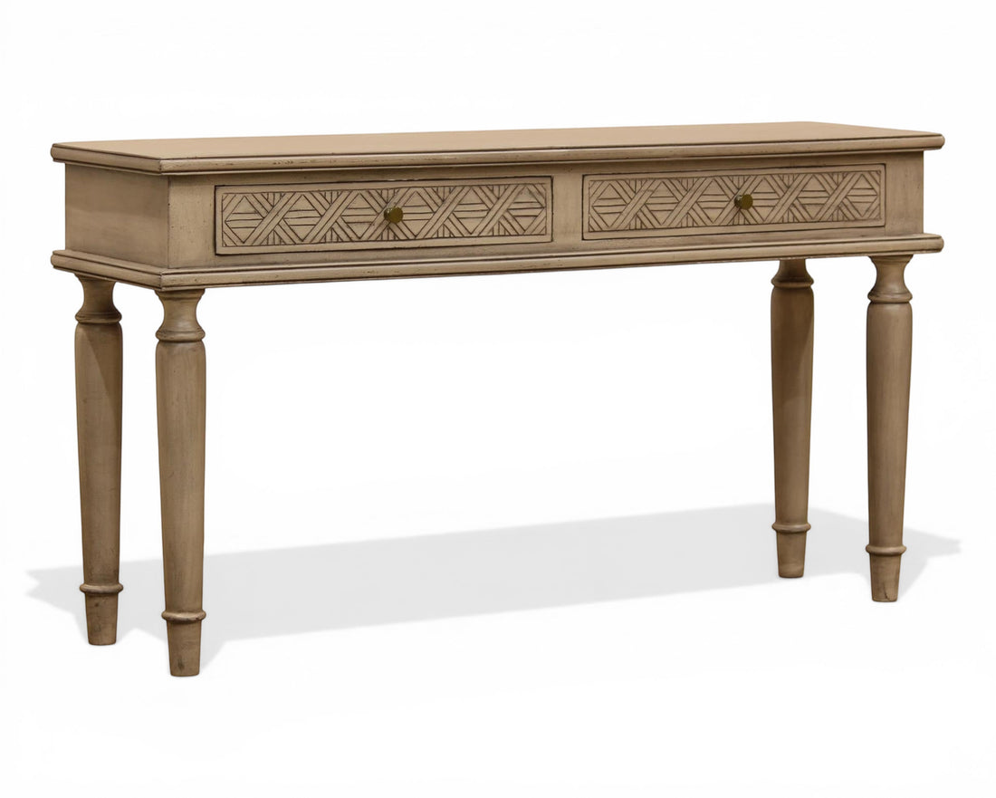 Nakoda Homes distressed grey wood console table with two carved drawers and brass knobs, turned legs.
