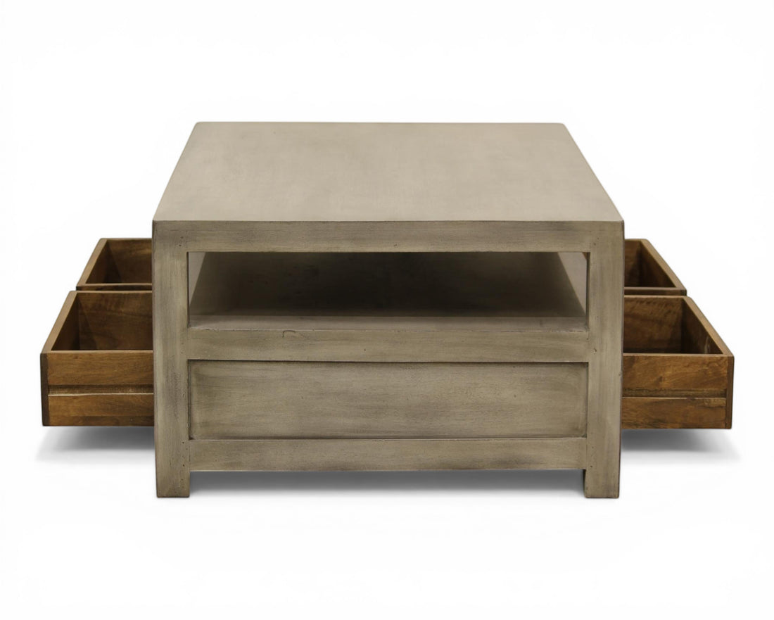 Nakoda Homes modern grey wash wood coffee table with open shelf and two pull-out drawers.