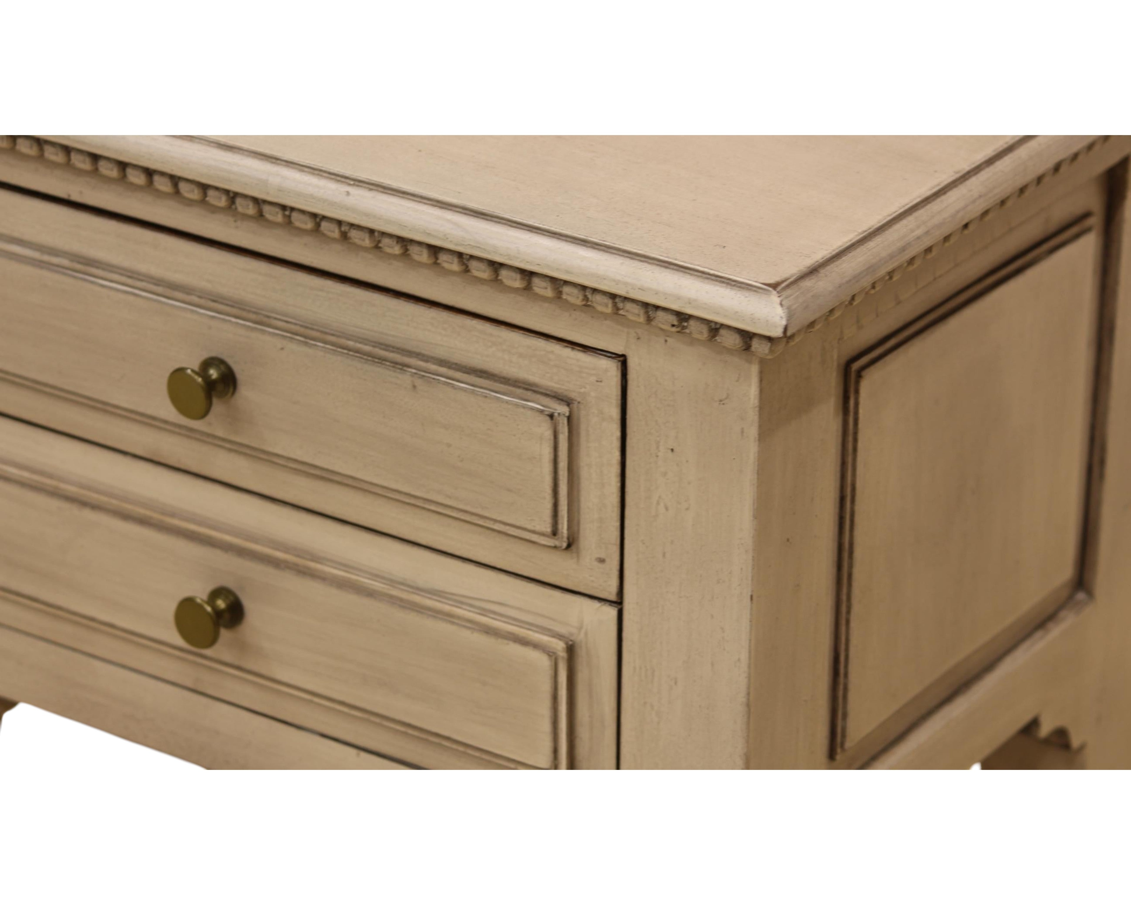 Nakoda Homes distressed grey wood two-drawer accent table with brass knobs and beaded trim