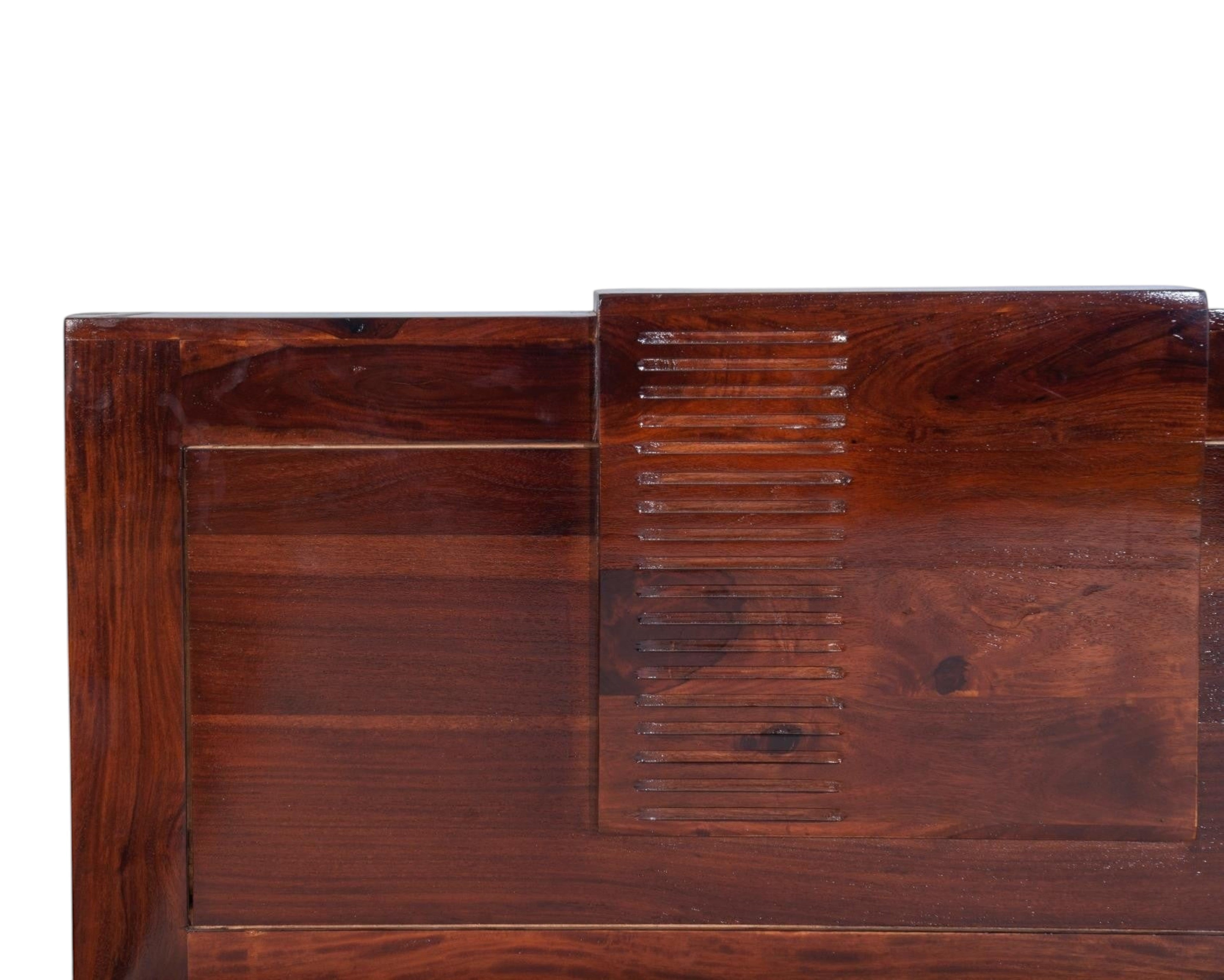 Nakoda Homes modern solid wood bed frame in warm brown with stepped, grooved headboard detail.
