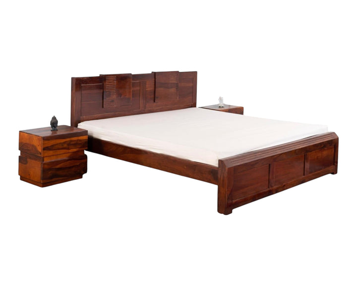 Nakoda Homes modern solid wood platform bed frame with stepped, grooved headboard in warm brown finish.