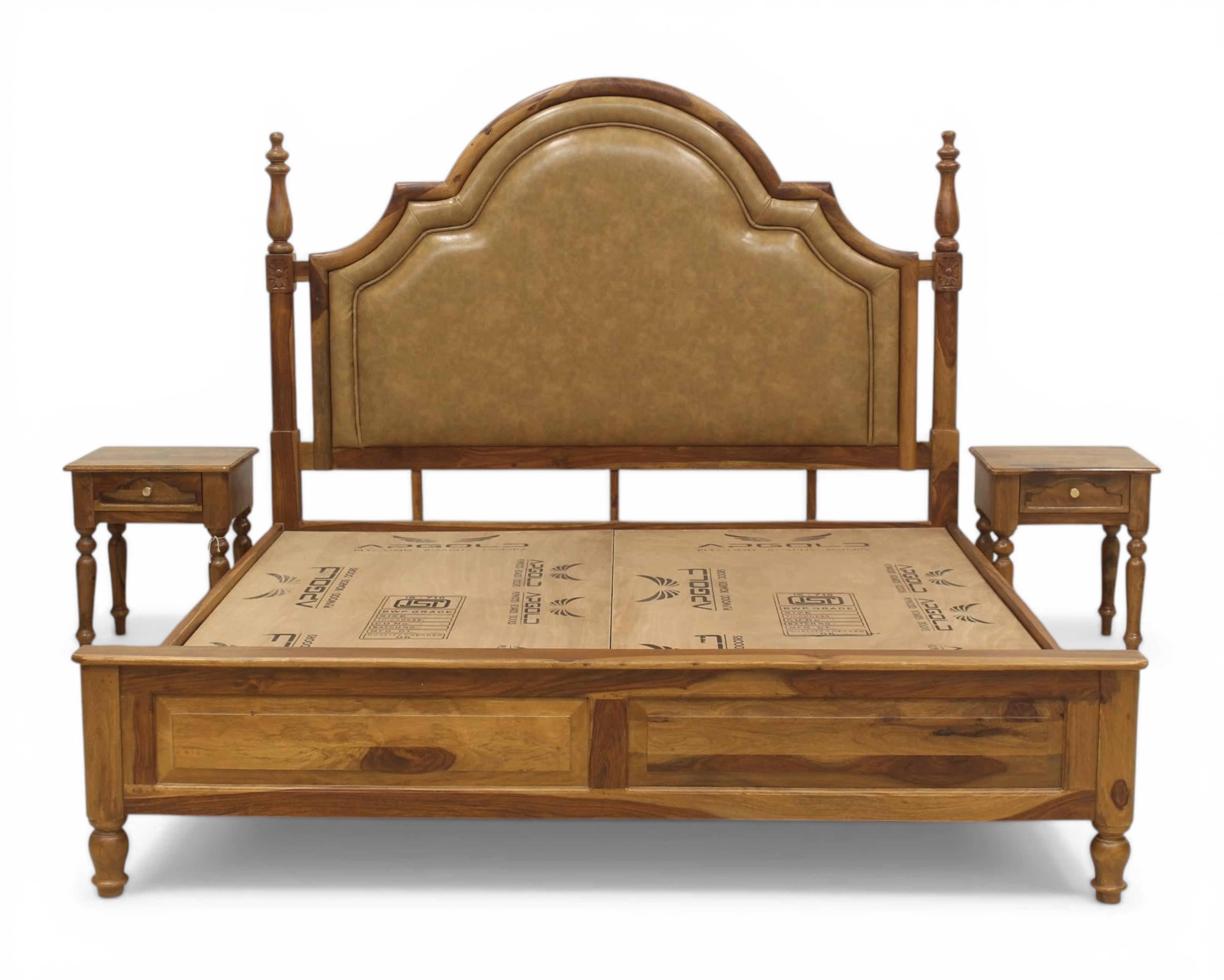 Nakoda Homes ornate wooden bed frame with padded tan headboard and storage drawers. Classic traditional design.