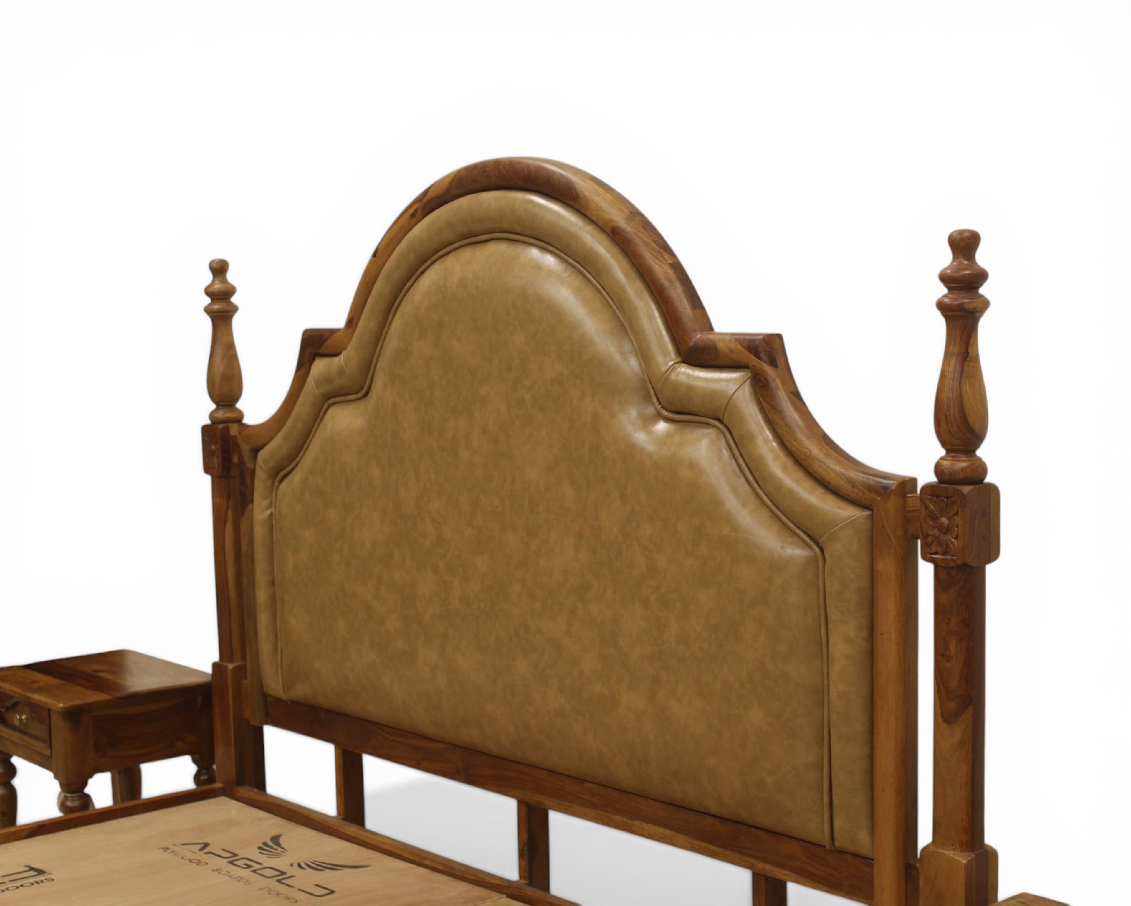Nakoda Homes ornate wooden bed frame with padded tan headboard and turned posts. Classic traditional design with storage drawers.
