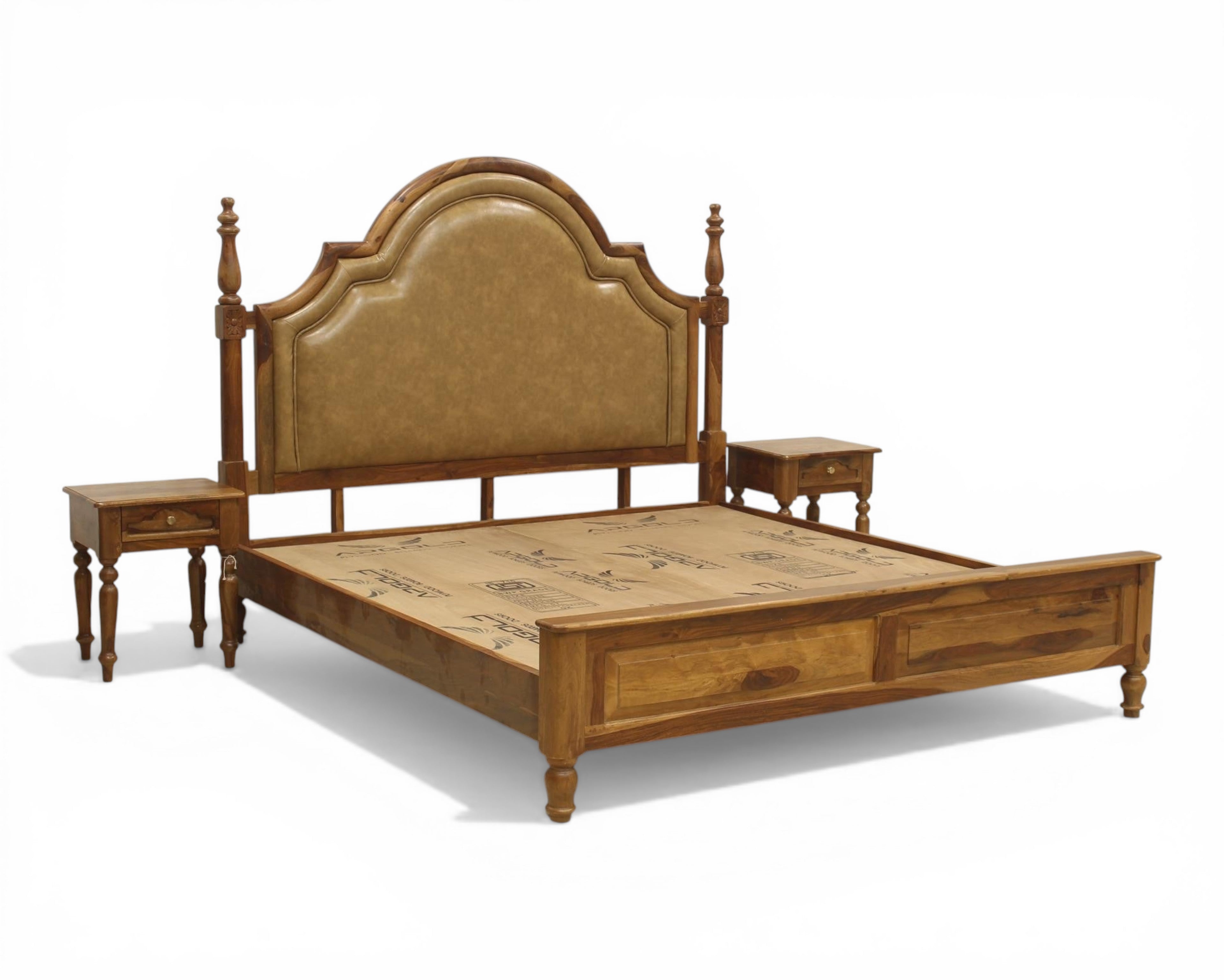 Nakoda Homes ornate wooden bed frame with padded tan headboard and storage drawers. Classic design with turned posts.
