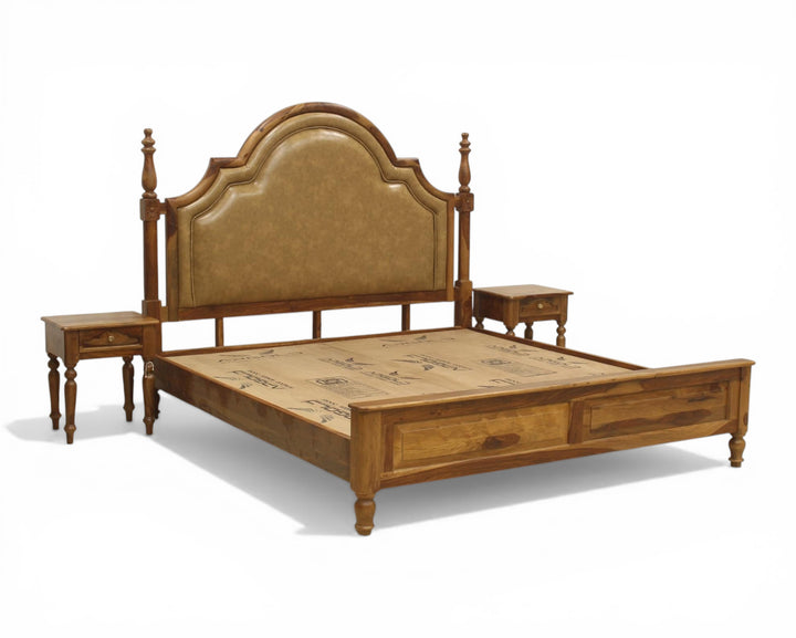 Nakoda Homes ornate wooden bed frame with padded tan headboard and storage drawers. Classic design with turned posts.