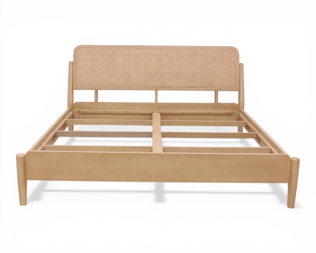 Nakoda Homes natural rattan headboard bed frame in light wood with minimalist design. Offers organic warmth and modern elegance.