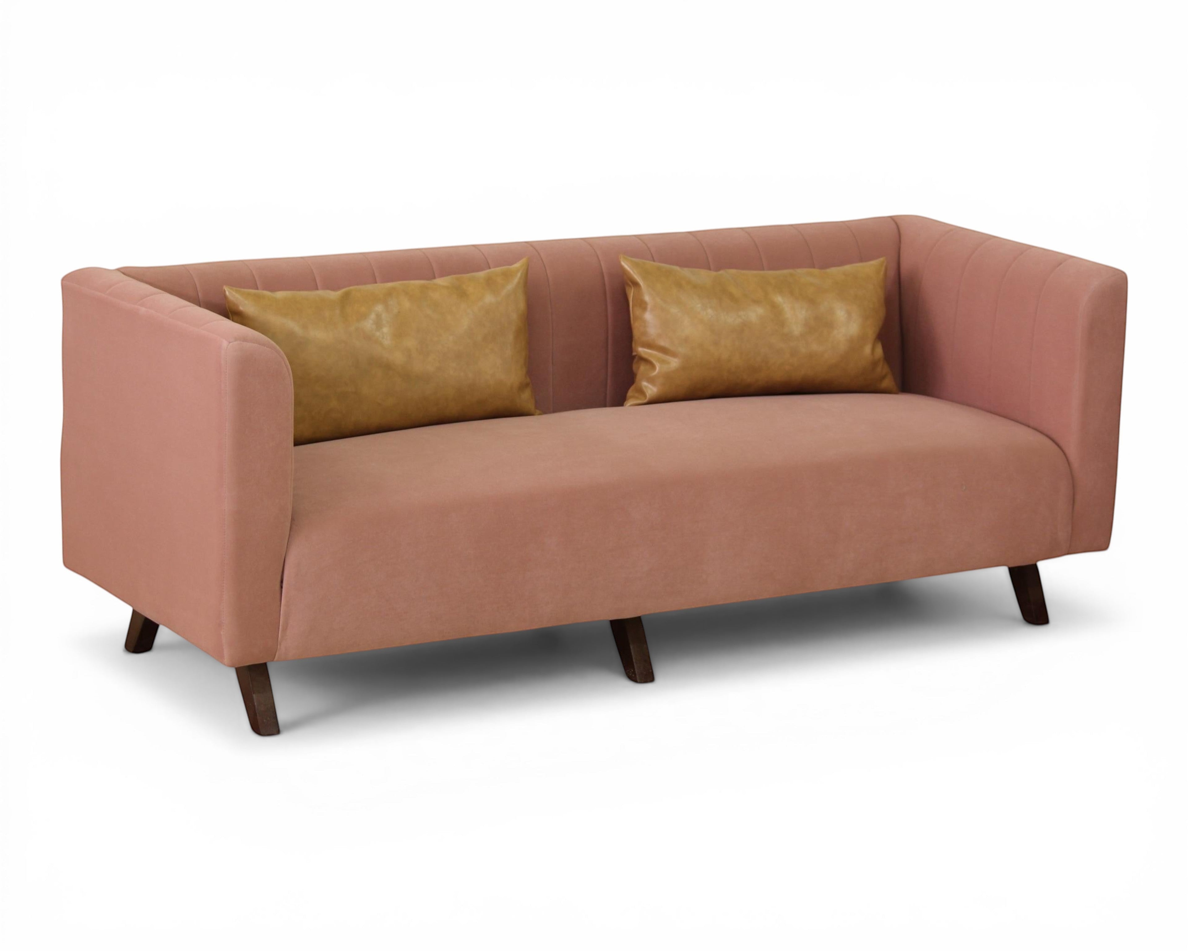Nakoda Homes modern rose velvet sofa with channel tufting and two faux leather accent pillows on dark wood legs.
