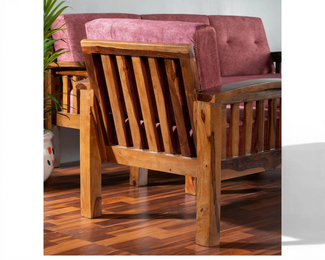 Nakoda Homes modern wooden sofa set with rose-colored upholstery and slatted back design.