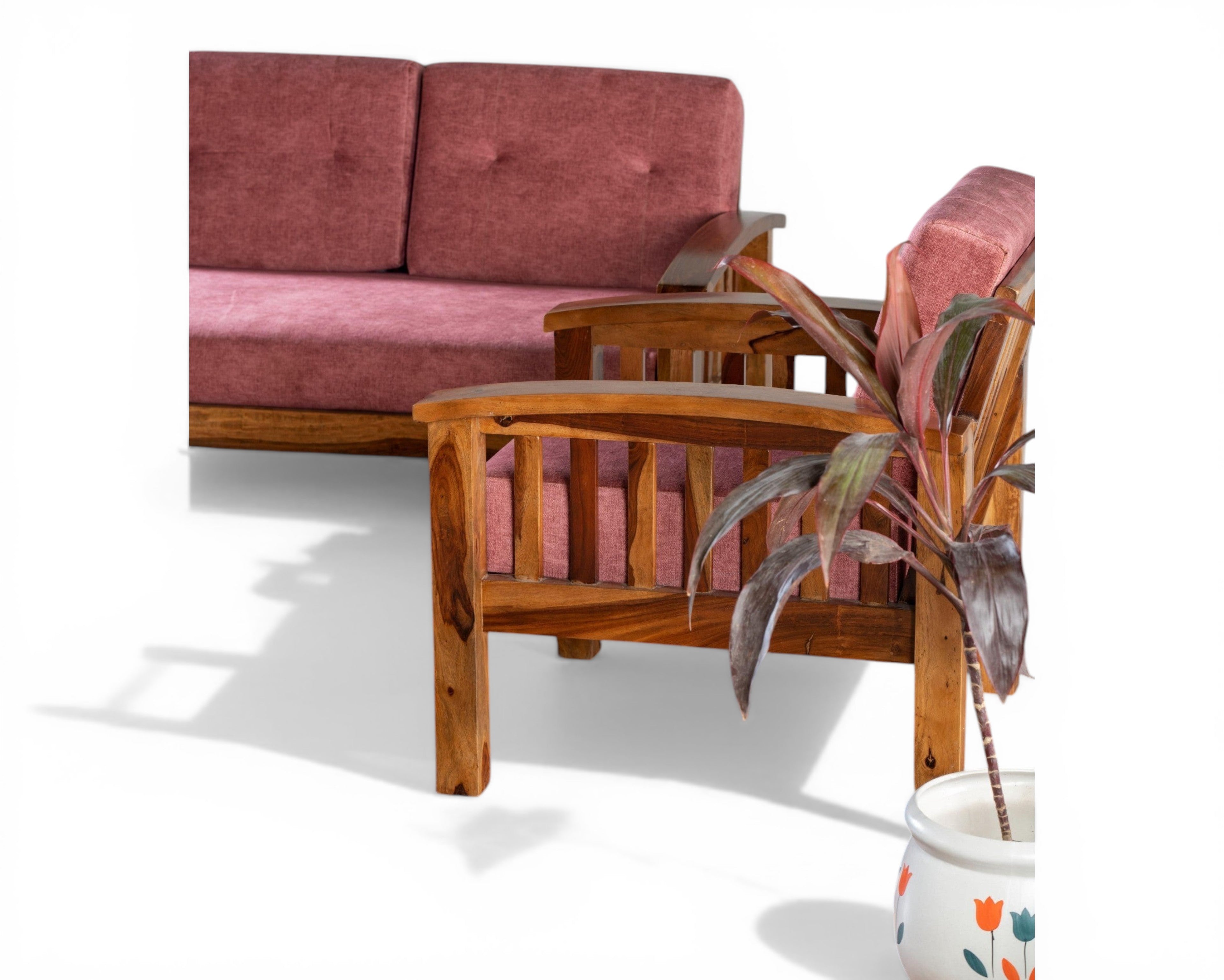 Nakoda Homes modern rose wooden sofa set with slatted back and plush cushions.