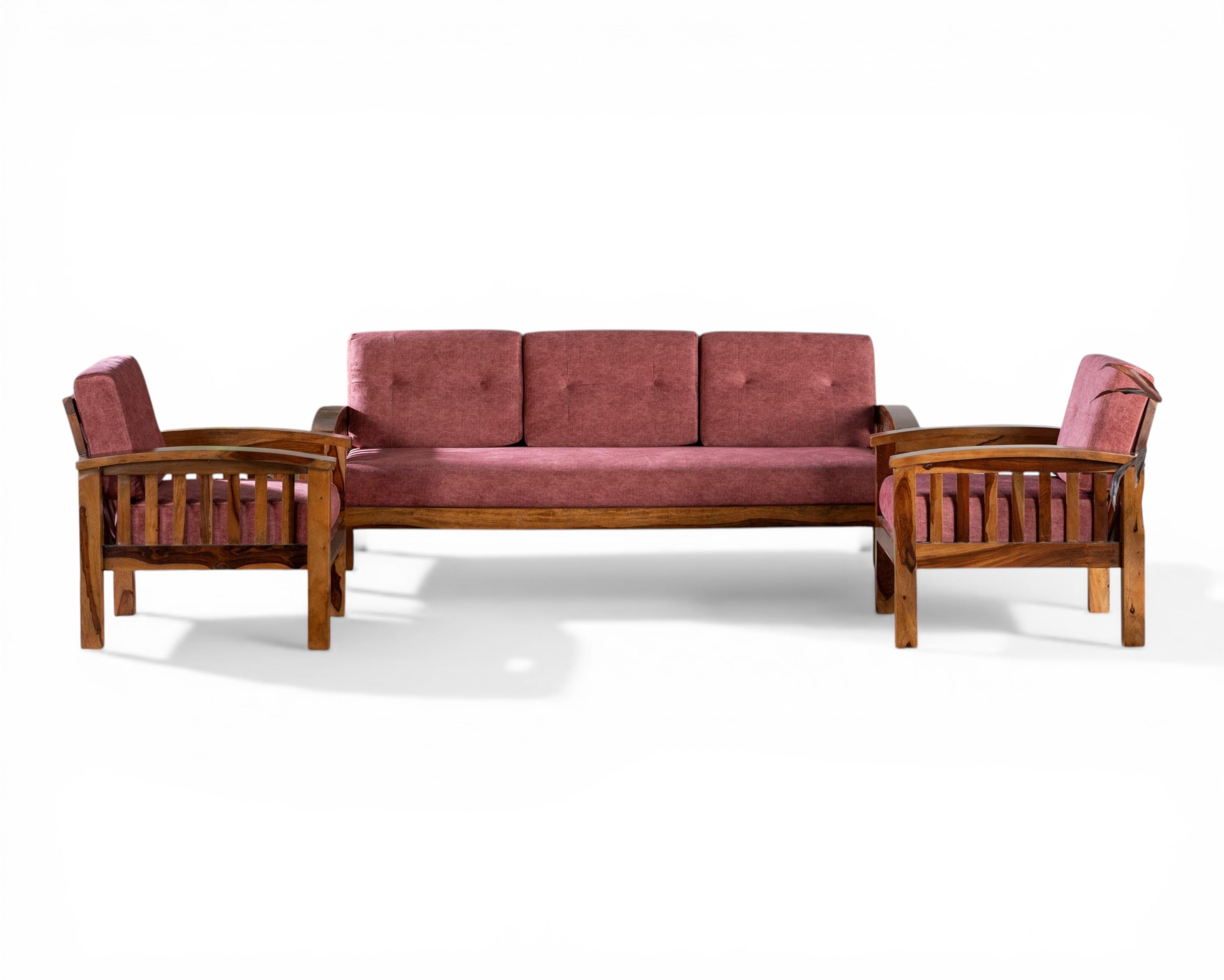 Nakoda Homes rose-colored wooden sofa set with slatted back design and plush cushions.