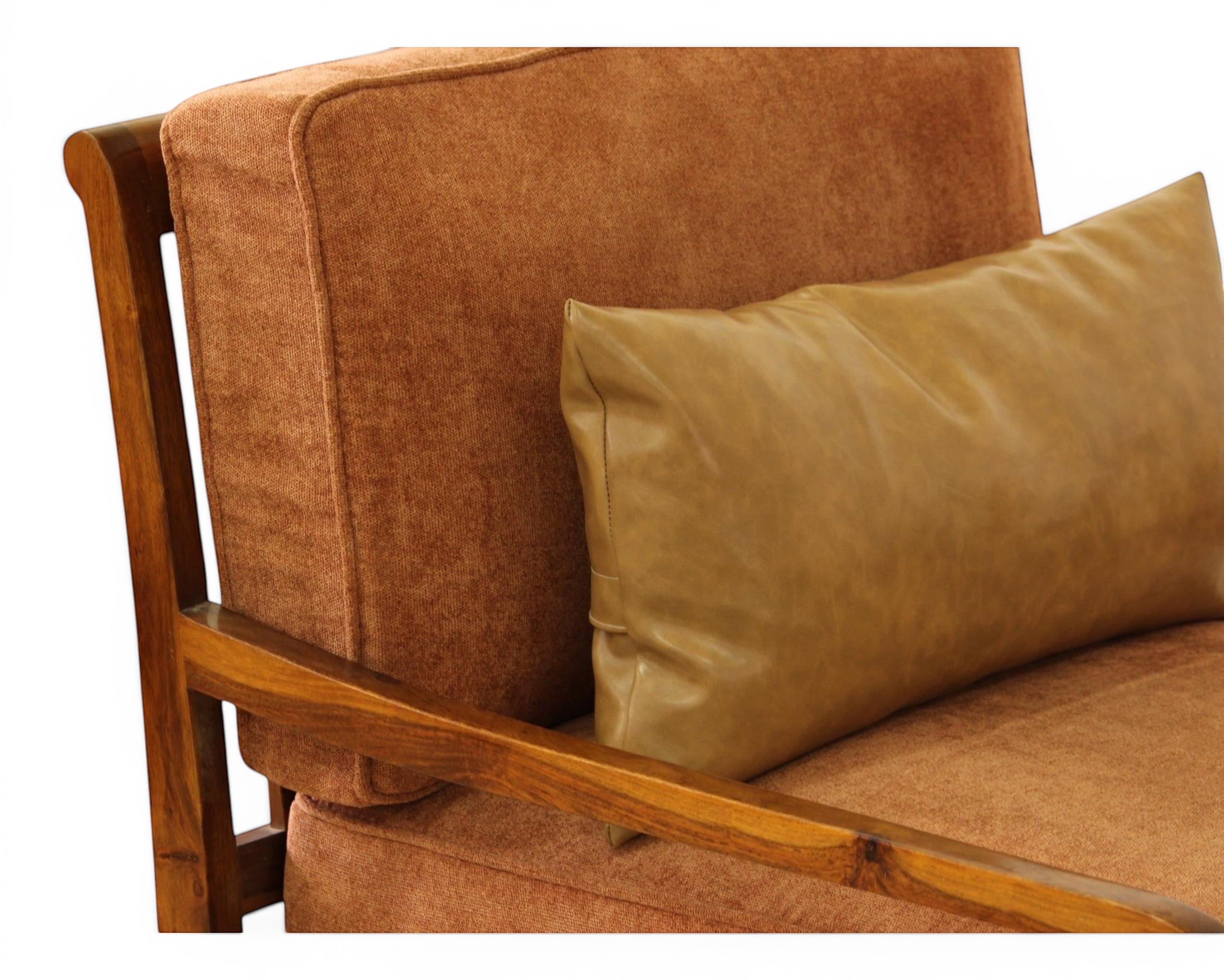Nakoda Homes 3-piece sofa set in rust-colored fabric with wooden frame and tan faux-leather lumbar pillows.