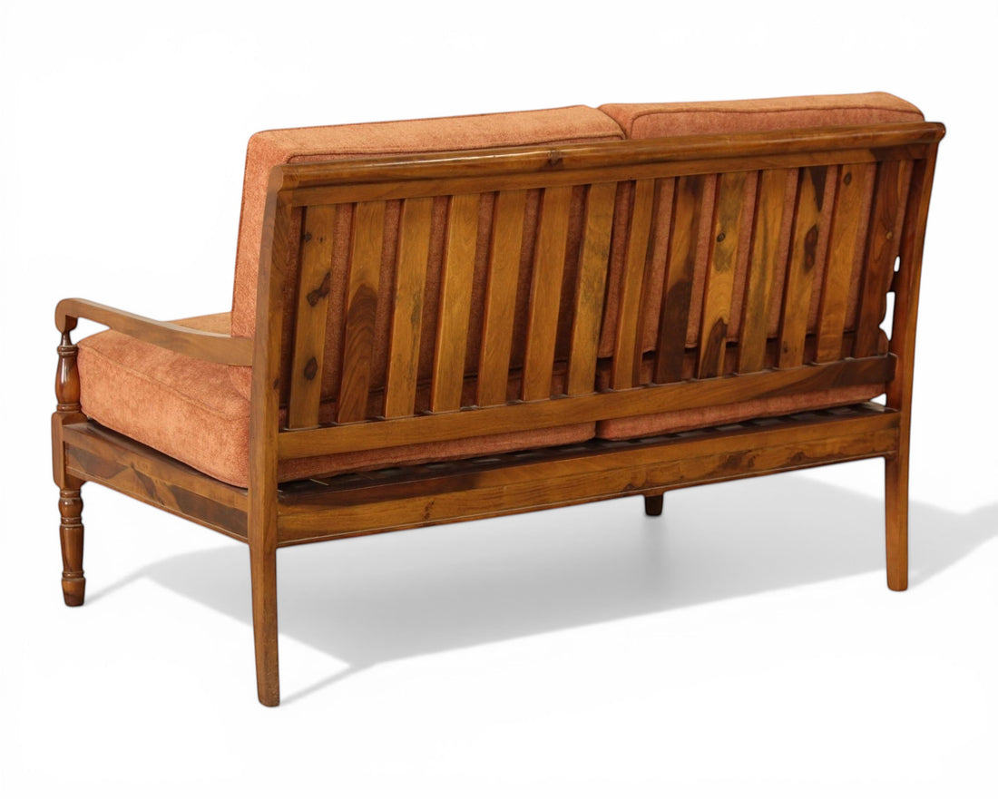 Nakoda Homes 3-piece living room sofa set with rust-colored upholstered seats and wooden frame. Features slatted backrest and armrests.