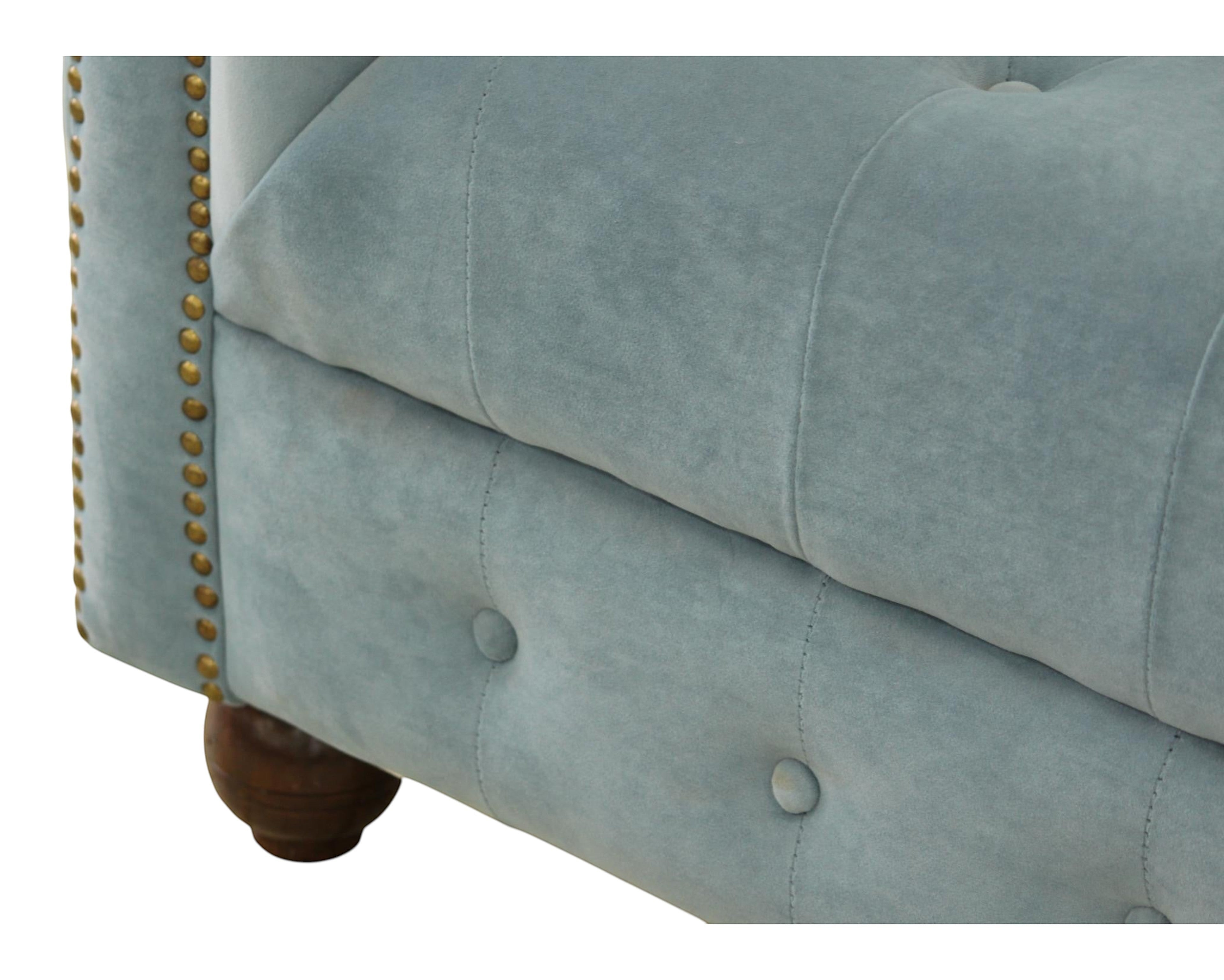 Nakoda Homes sky blue velvet Chesterfield sofa with button-tufting and nailhead trim.