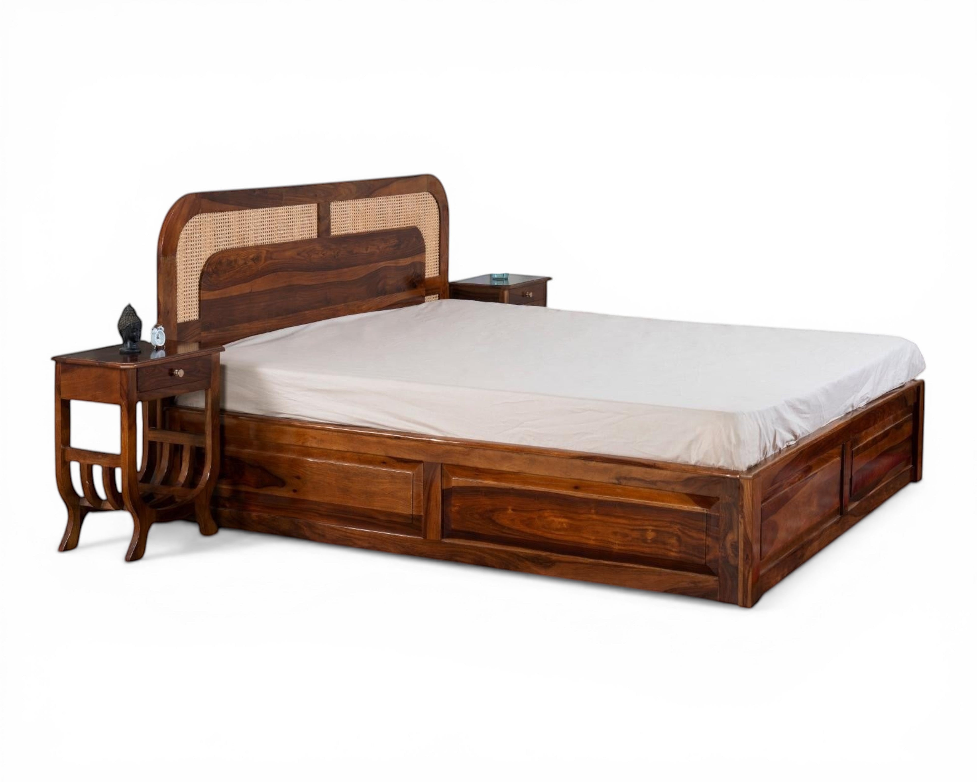 Nakoda Homes solid wood platform bed with cane headboard and storage drawers. Warm wood finish.