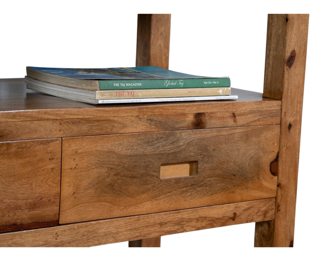 Nakoda Homes solid wood console table with two drawers and visible grain. Rustic natural wood finish.