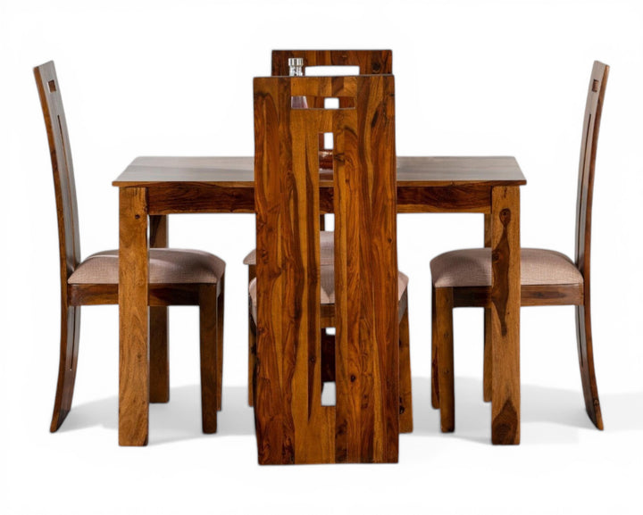Nakoda Homes solid wood dining set with four chairs and a table, featuring natural wood grain and minimalist design.