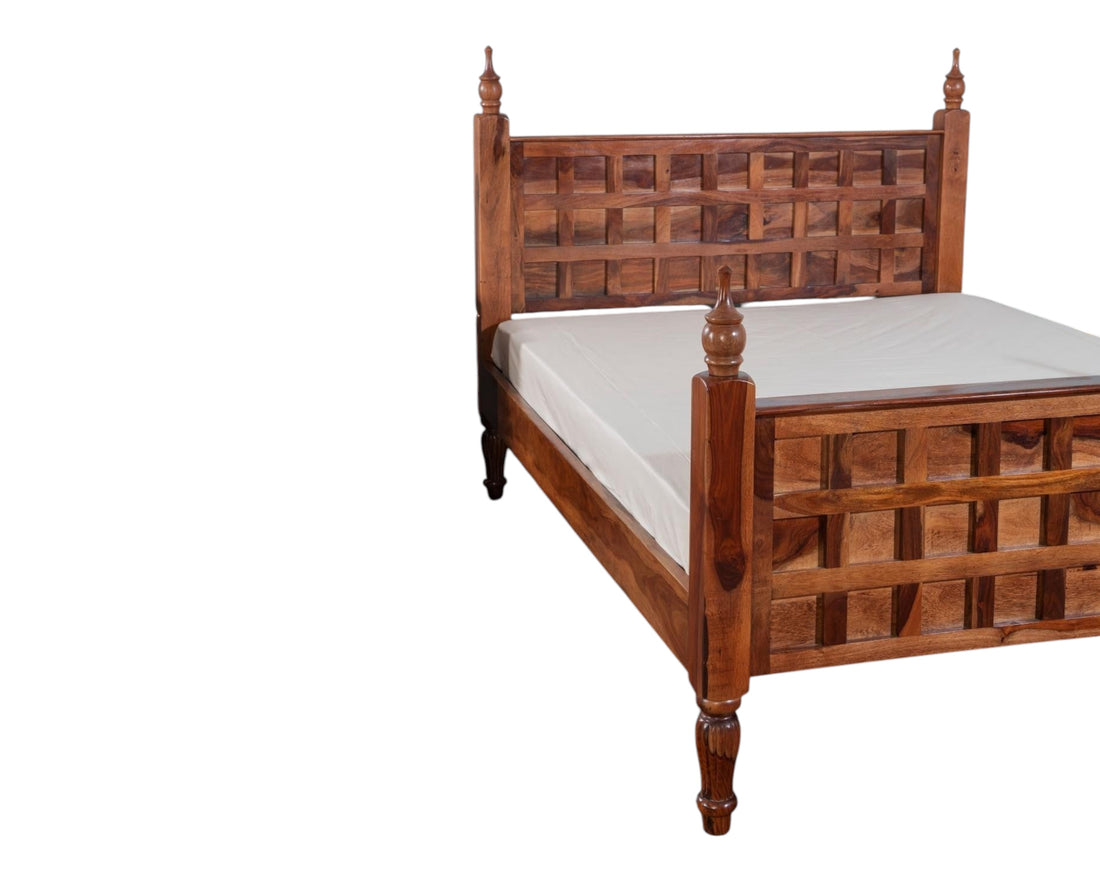 Nakoda Homes solid wood bed frame with lattice headboard, turned posts, and finials. Traditional rustic design.