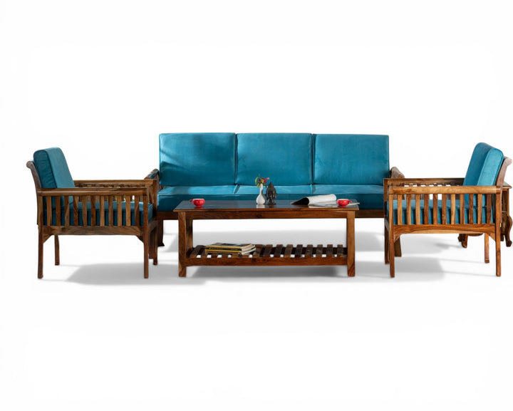 Nakoda Homes solid wood living room set with blue cushions and slatted coffee table. Features geometric lattice design.