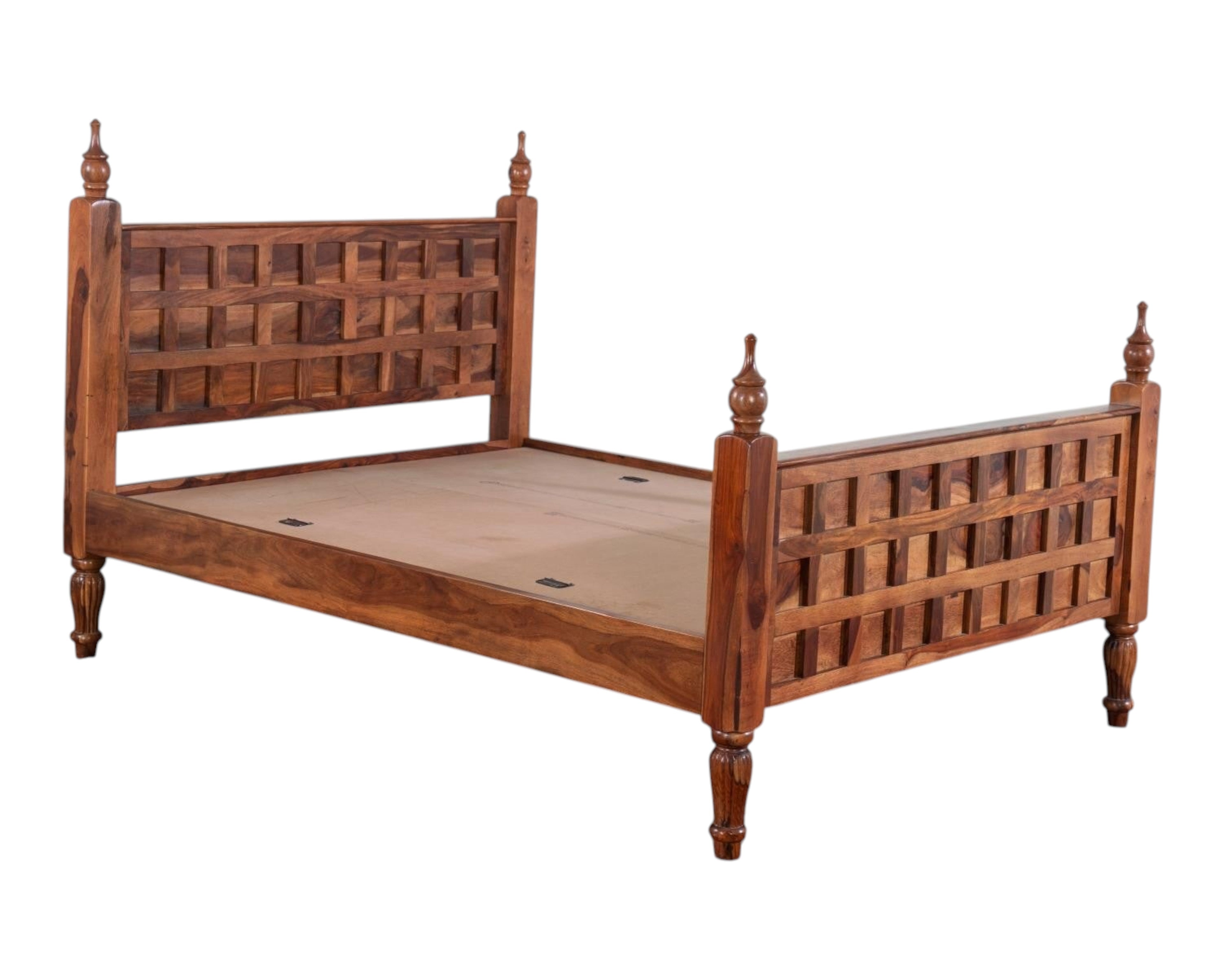 Nakoda Homes solid wood bed frame with lattice headboard, turned posts, and finials. Traditional rustic design.