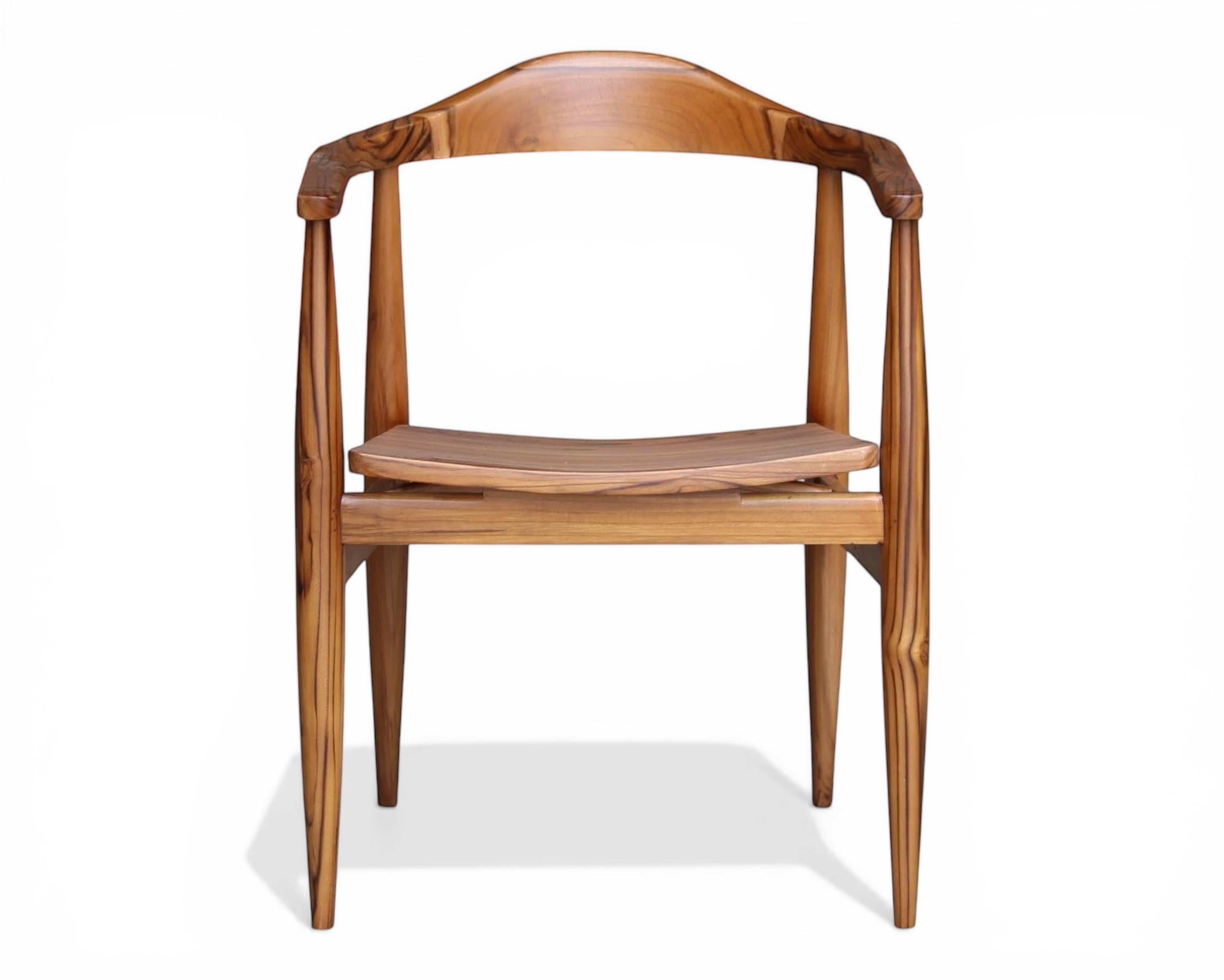 Nakoda Homes solid wood dining chair with curved back and tapered legs, natural wood finish.