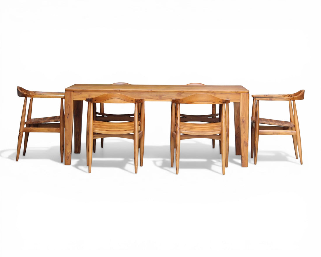 Nakoda Homes solid wood teak dining set with six chairs, featuring a natural wood finish and elegant grain.