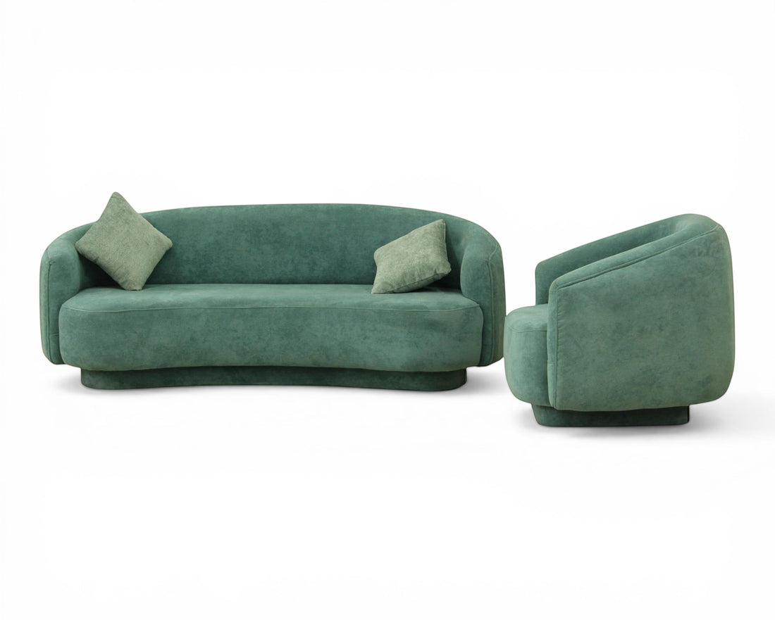 Nakoda Homes teal upholstered sofa set with curved silhouette and rounded arms, plush fabric, includes 3-seater sofa and armchair with throw pillows.