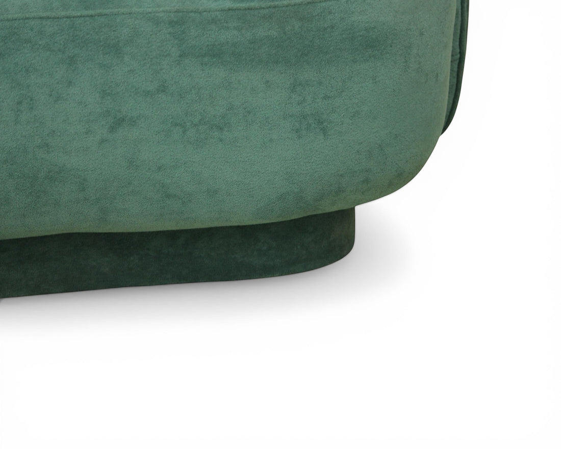 Nakoda Homes teal upholstered curved sofa set in soft-touch fabric with rounded arms and low-profile base.
