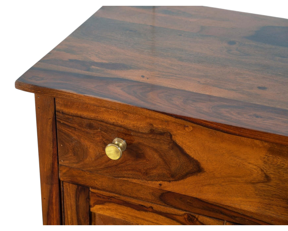 Nakoda Homes wooden shoe cabinet with upholstered bench and decorative tile doors. Warm wood finish.