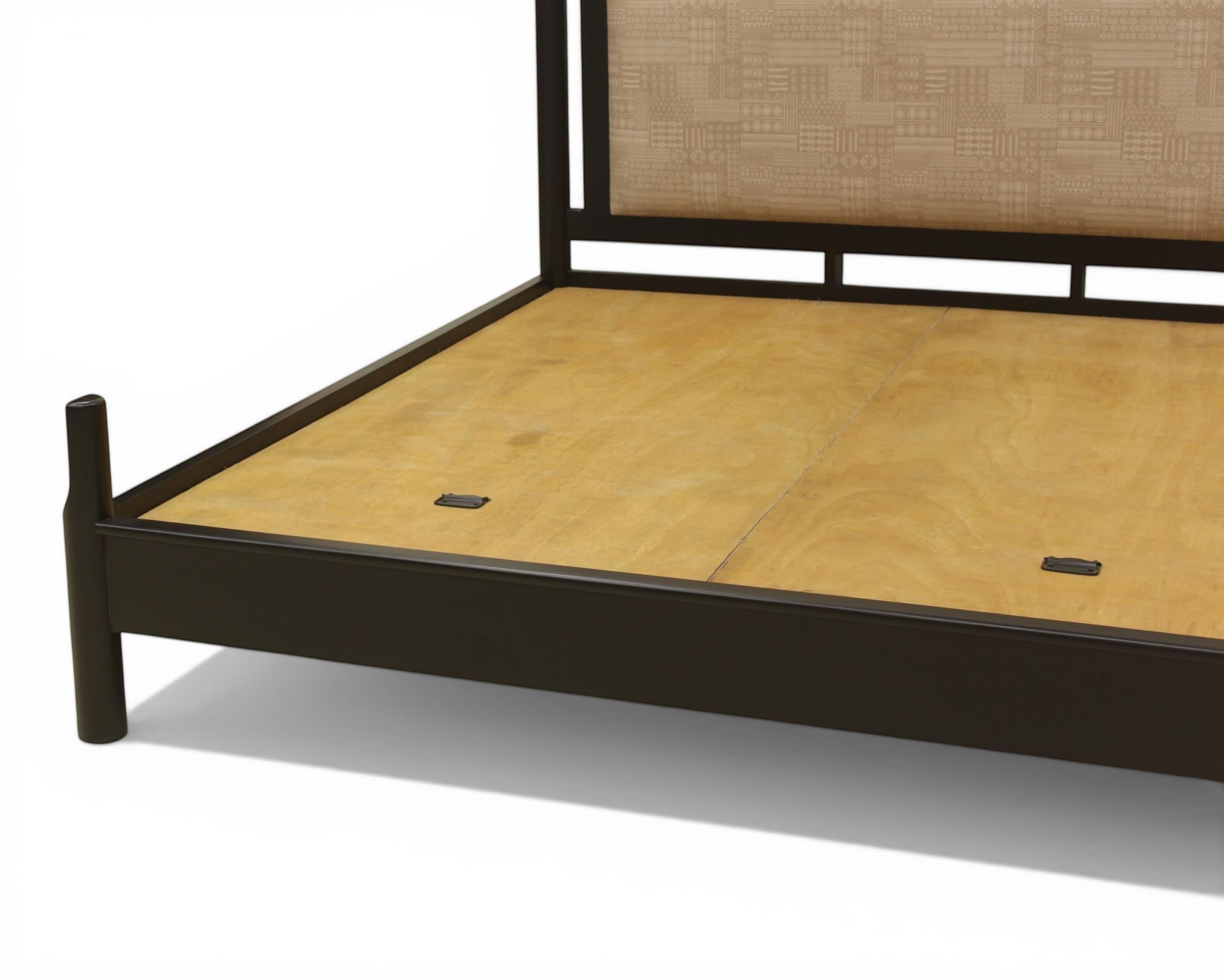 Nakoda Homes black metal platform bed frame with beige upholstered headboard featuring geometric pattern. Includes under-bed storage.