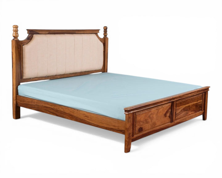 Nakoda Homes classic wooden bed frame with upholstered beige headboard and warm wood finish. Sturdy, elegant design for a sophisticated bedroom.