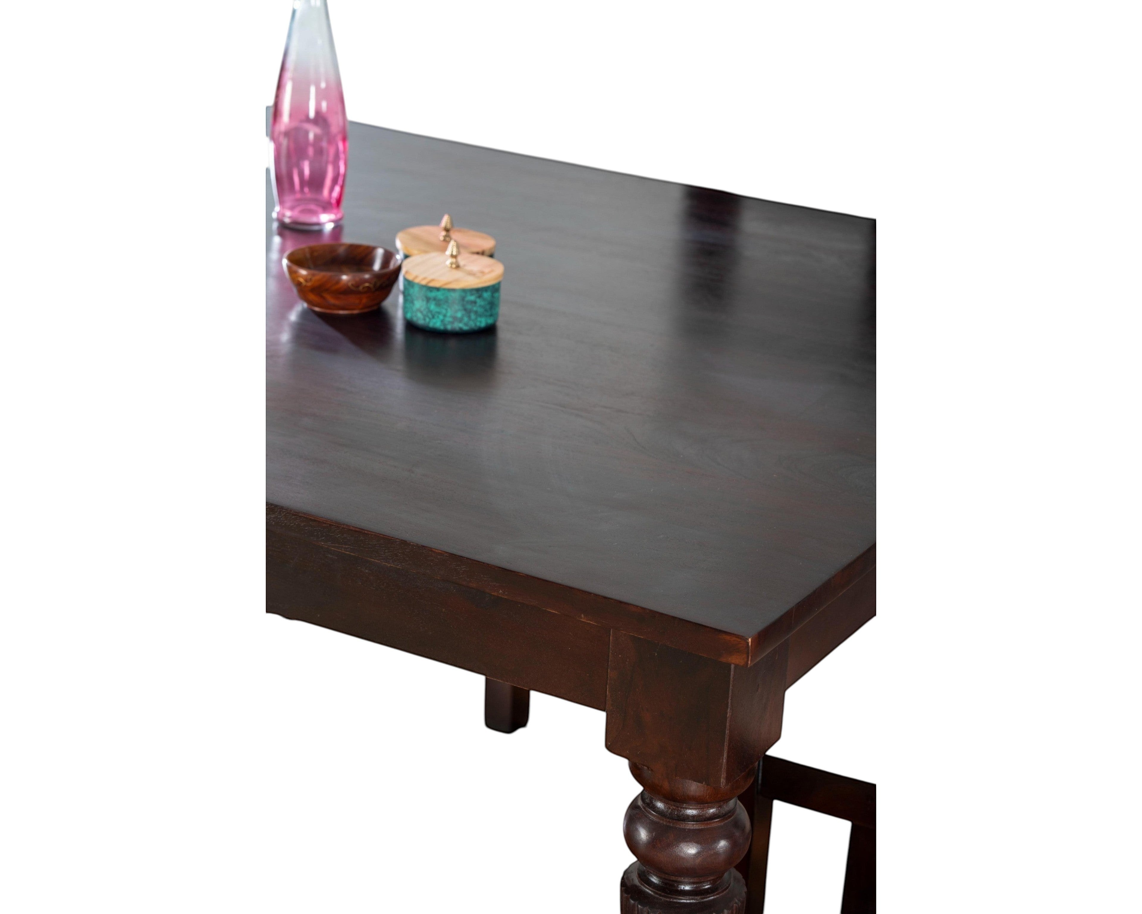 Nakoda Homes dark wood dining set with turned legs and upholstered chairs. Classic design for any home.