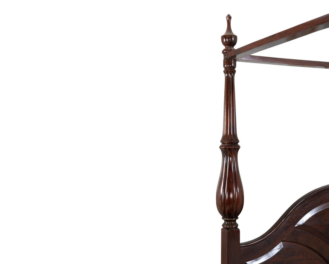 Nakoda Homes dark wood four poster bed frame with turned posts and arched headboard. Traditional design.