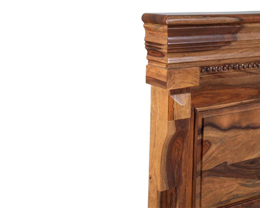 Nakoda Homes Grand Wooden Storage Bed Frame with detailed paneling and elegant headboard in rich natural wood.