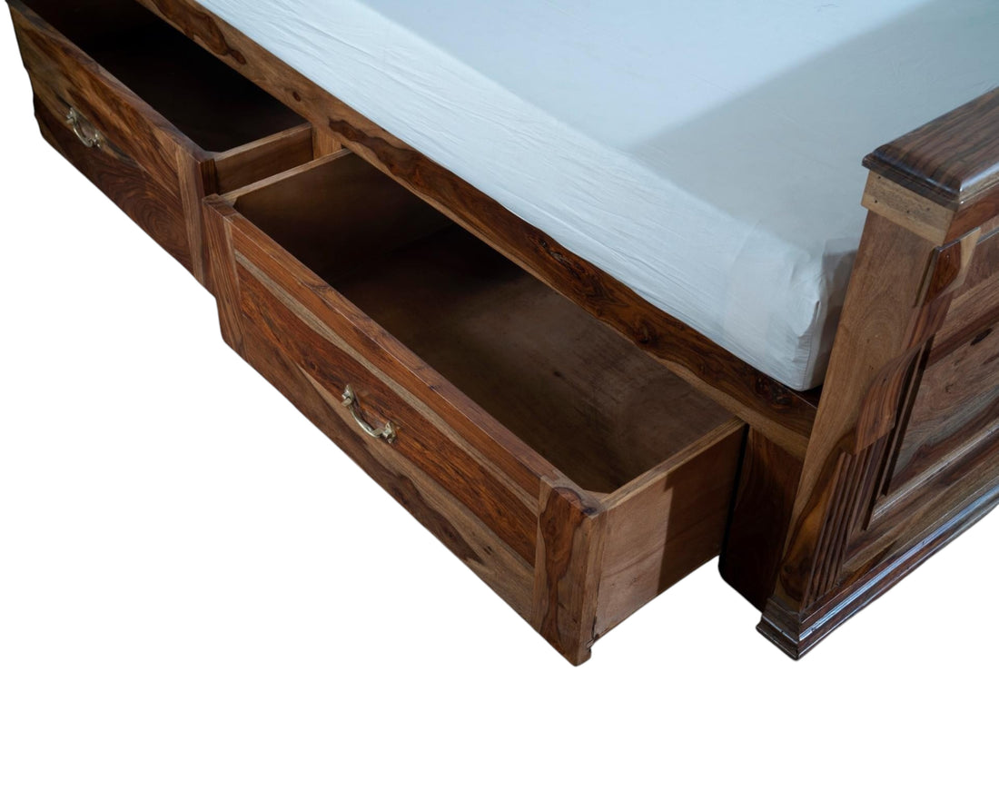Nakoda Homes Grand Wooden Storage Bed Frame with integrated drawers and elegant headboard, crafted from rich natural wood.