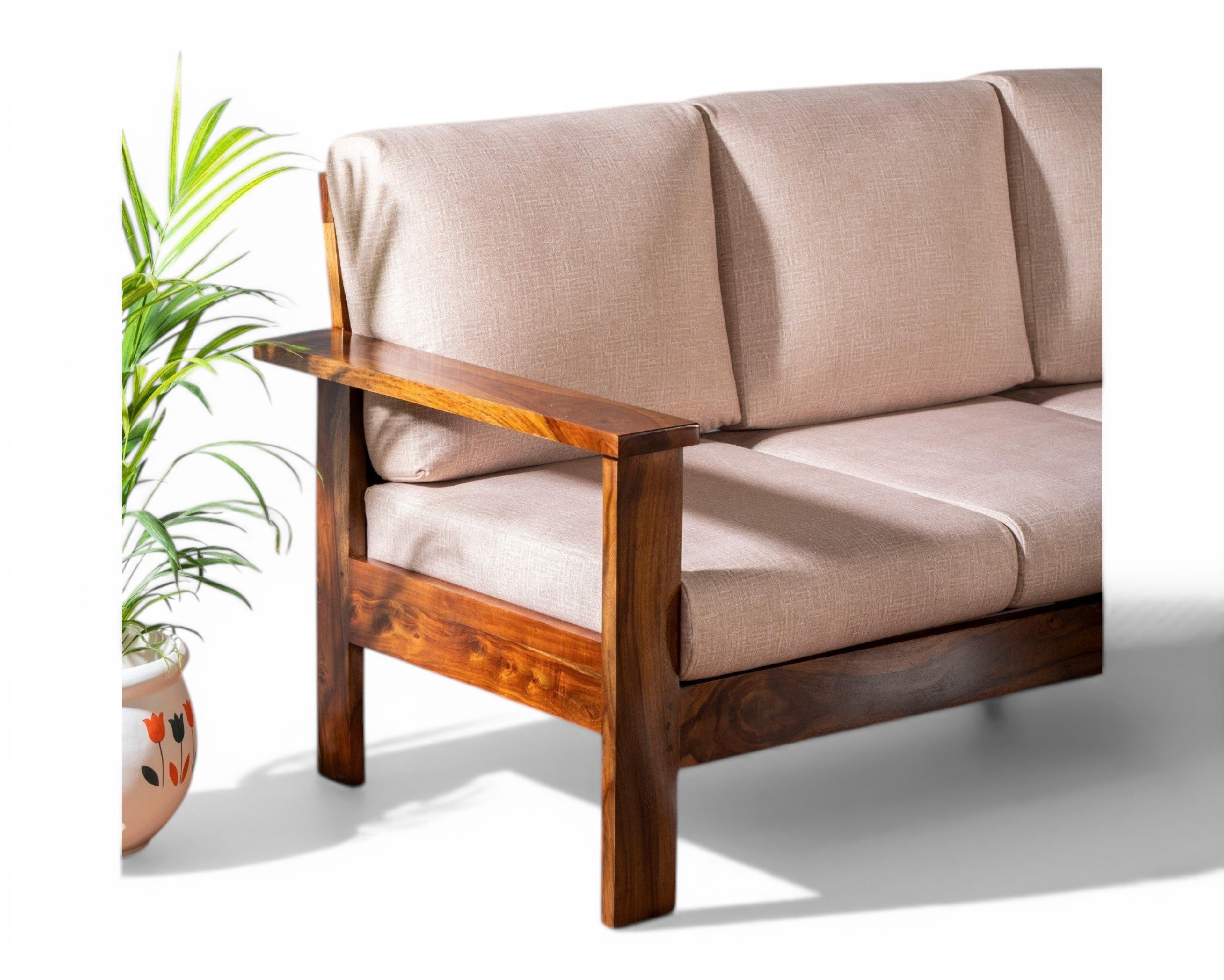 Nakoda Homes modern 3-seater sofa in natural wood with beige linen upholstery and clean lines.