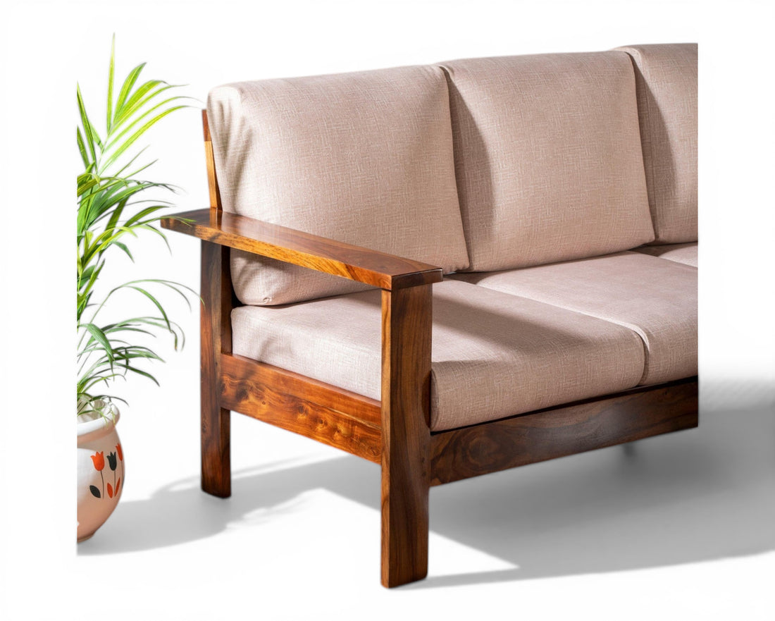 Nakoda Homes modern 3-seater sofa in natural wood with beige linen upholstery and clean lines.