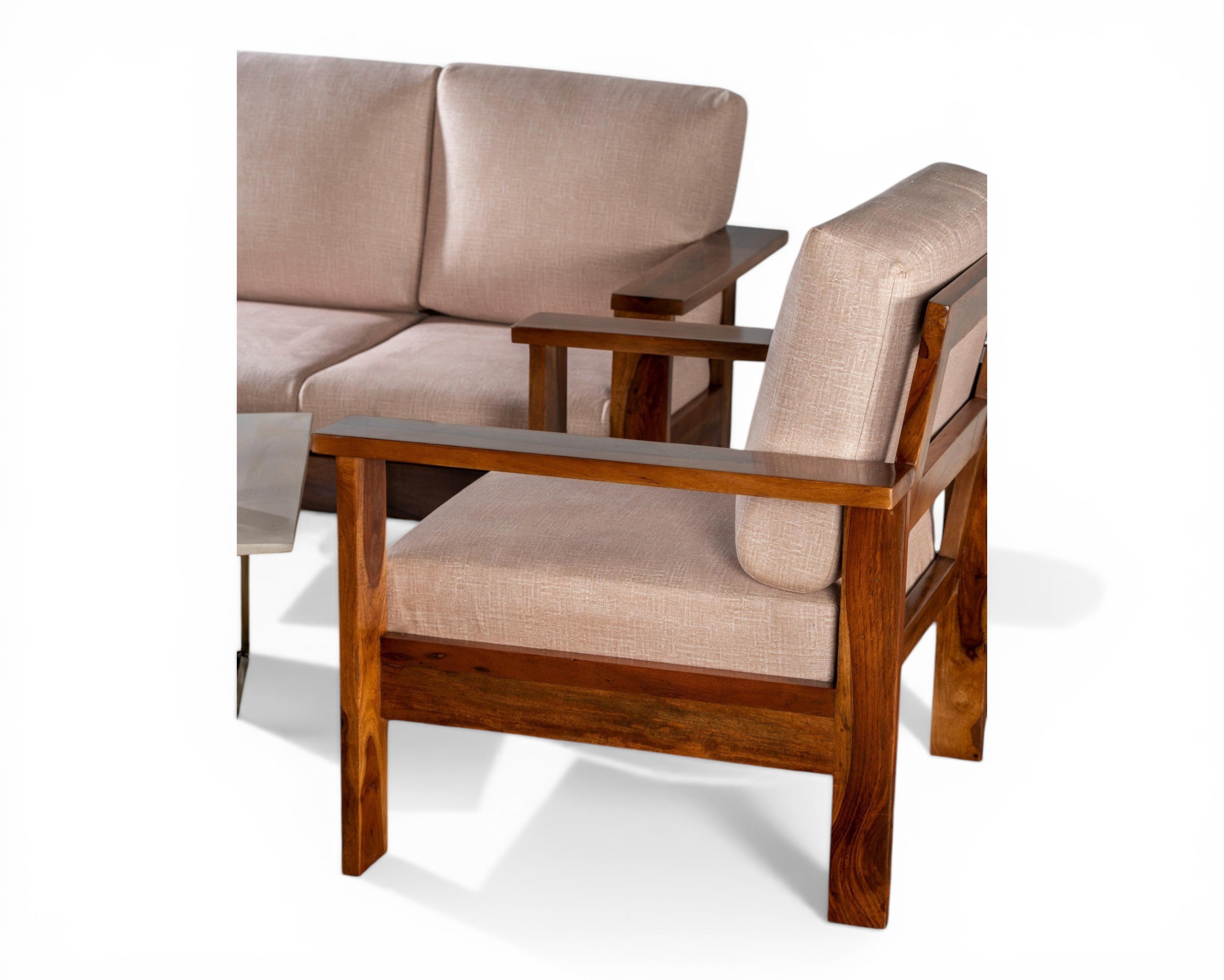 Nakoda Homes modern 3-seater sofa with plush neutral cushioning and solid wood frame. Features clean lines and wooden arms.