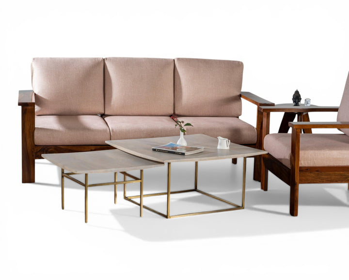 Nakoda Homes modern 3-seater sofa in light pink fabric with solid wood frame and nested coffee tables.