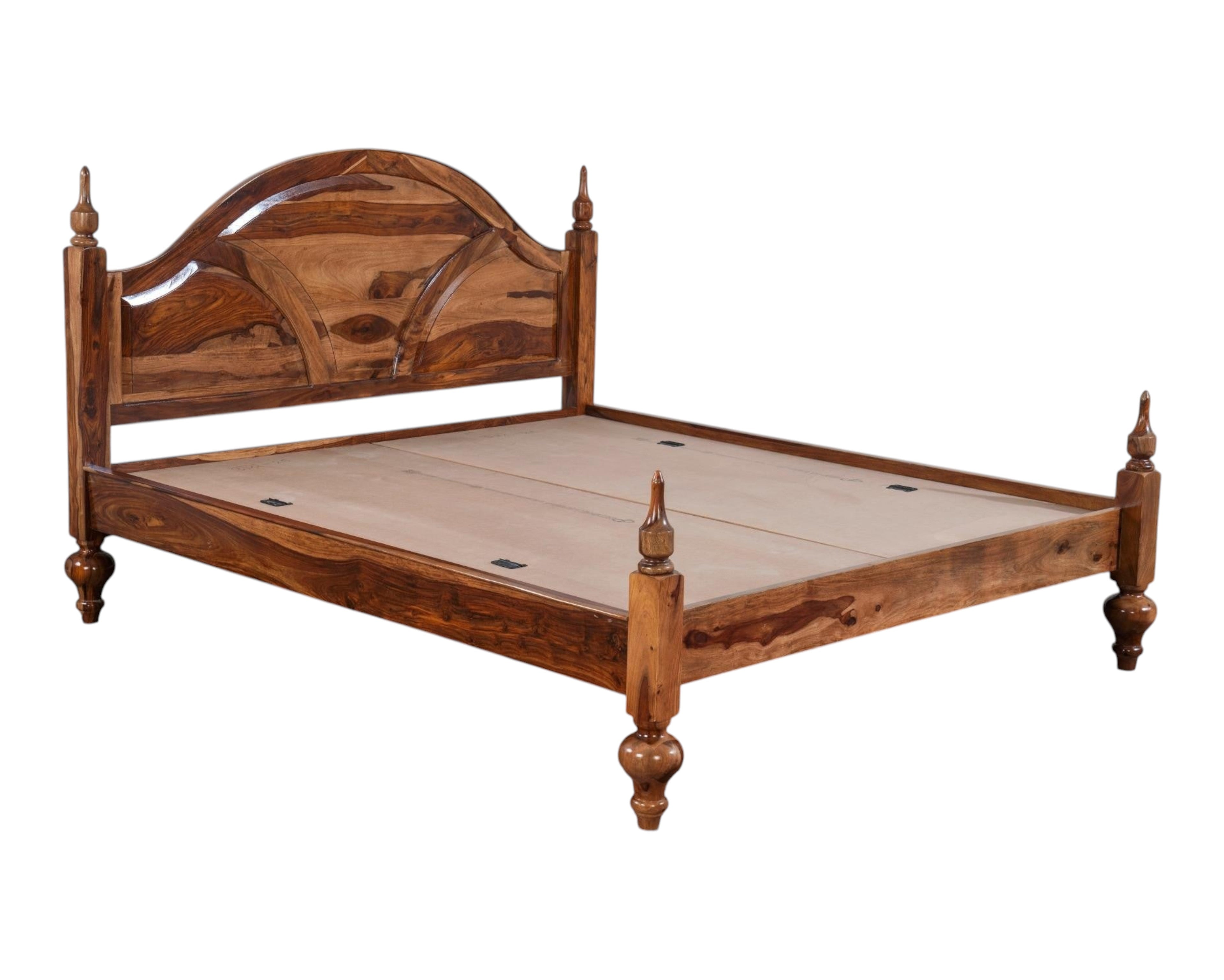 Nakoda Homes Ornate Sheesham wood bed frame with arched headboard, intricate carvings, and turned posts. Classic design.